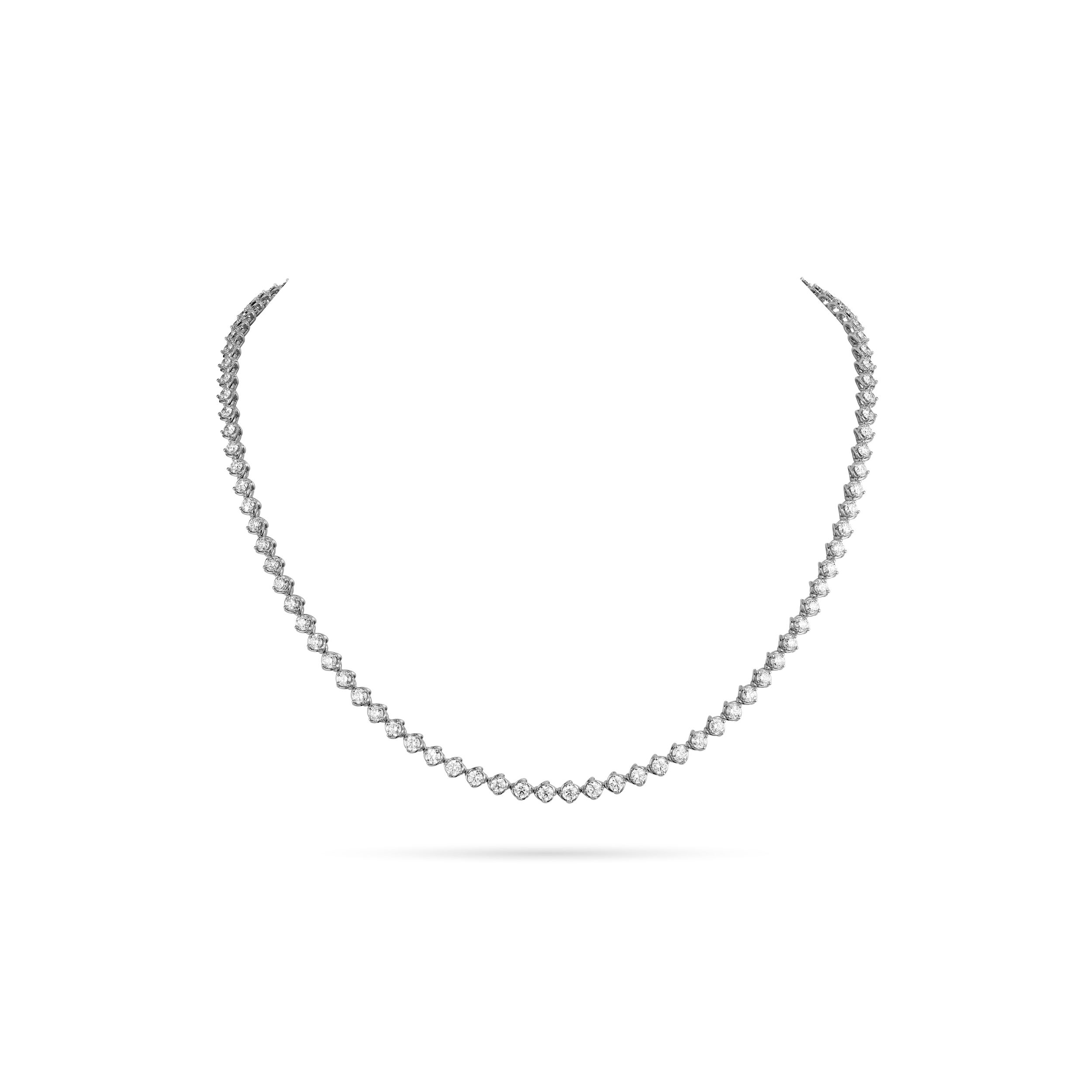 A modern twist on a timeless design, this line necklace features brilliant diamonds set in elegant twisted faux bezels. The unique setting adds texture and dimension, giving each diamond a distinctive frame that catches the light beautifully. A sophisticated piece perfect for layering or wearing solo.-18k White gold-Round diamonds, 6.87cts-Length, 16"Item# 165-2000043 Diamond Line Necklace