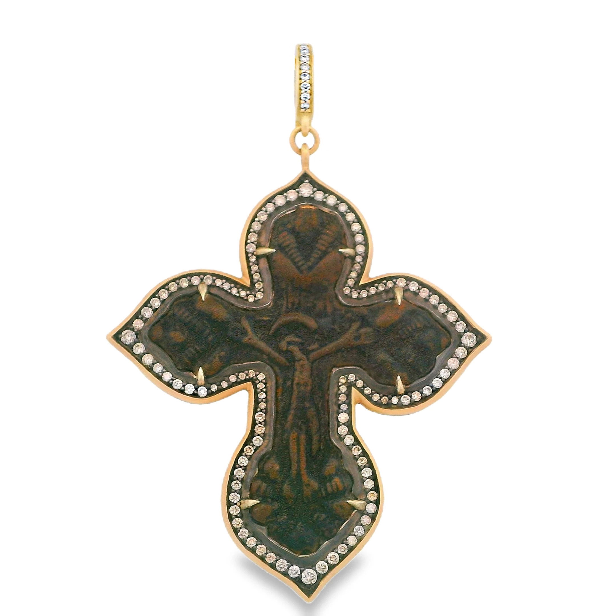 This 14k yellow gold cross pendant is delicately accented with sparkling diamonds, creating a timeless and elegant piece that is perfect for layering. Its classic design adds a touch of grace and meaning to any look.-14k Yellow gold-Diamonds, 1.2ctsItem# 806-2000141 Antique Crucifix Pendant