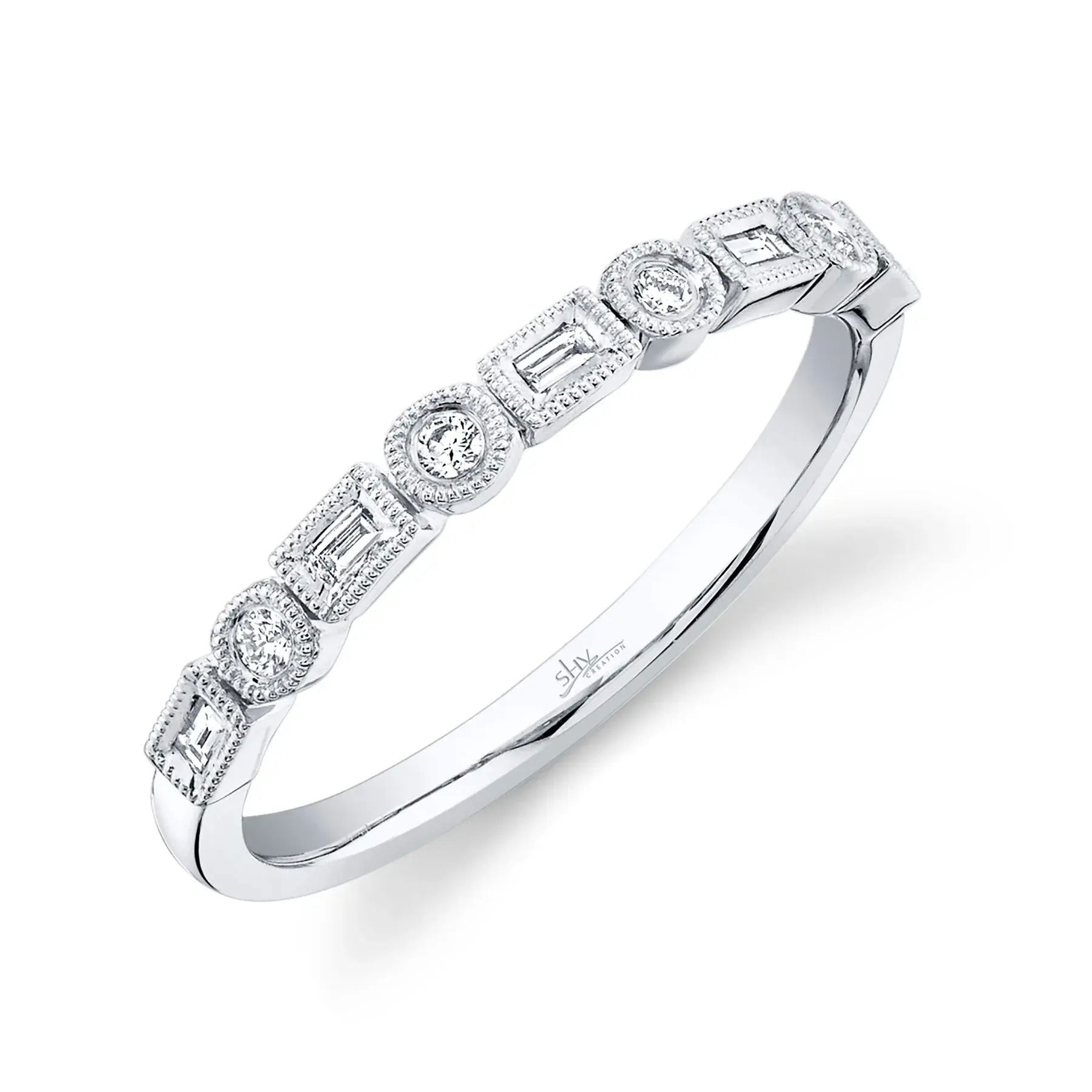 Designed for versatility, this piece complements your look whether it's for everyday wear or a night out. All Shy Creation diamonds are natural and hand-selected. All stones are unique and hand set. As a result, you can expect slight variations in the shade, hue, tint of the color stones and stone count.-14k White gold-Round diamonds, 0.14cts-Size 8-Item# 804-2000475 Kate Diamond Band