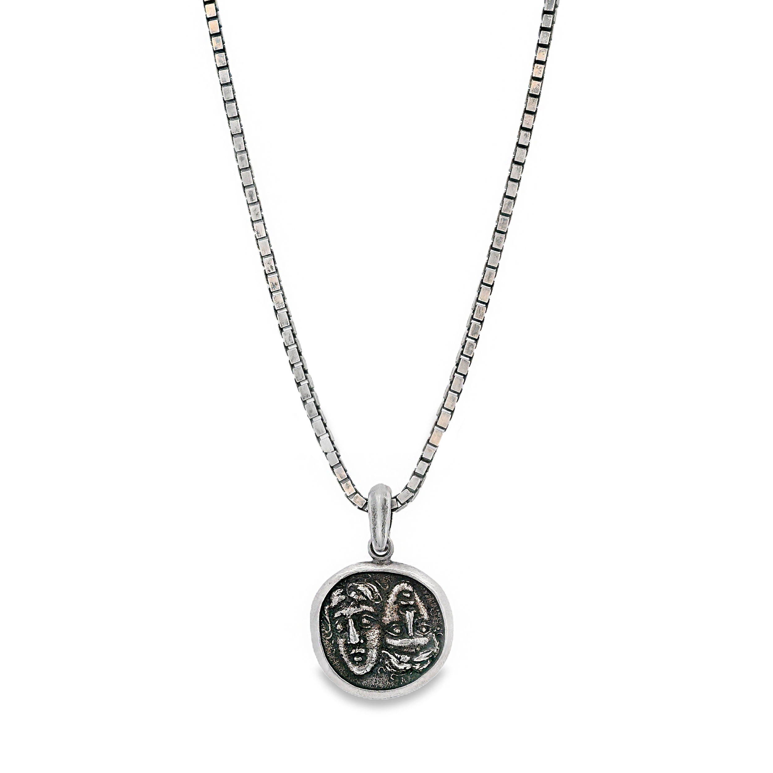 This sterling silver necklace features a coin pendant dressed with a classic Greek figure at its center. Its timeless design makes it a bold yet versatile addition to any collection.-Sterling silver-27x18mm Round Greek Figure-Length 24"Item# 800-2000047 Coin Pendant Necklace
