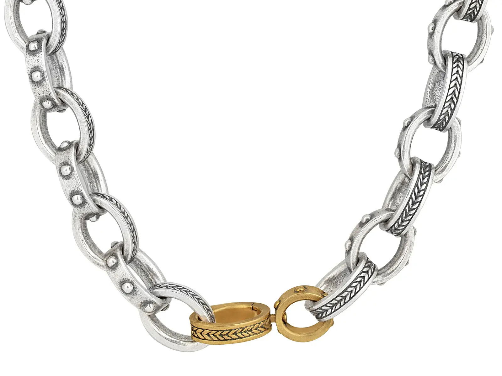 This short necklace combines sterling silver and brass with bold chevron-patterned oval links. Its striking design adds a modern, rugged edge to any look.-Sterling silver-Brass-Length 24"Item# 800-2000049 Silver Link Necklace