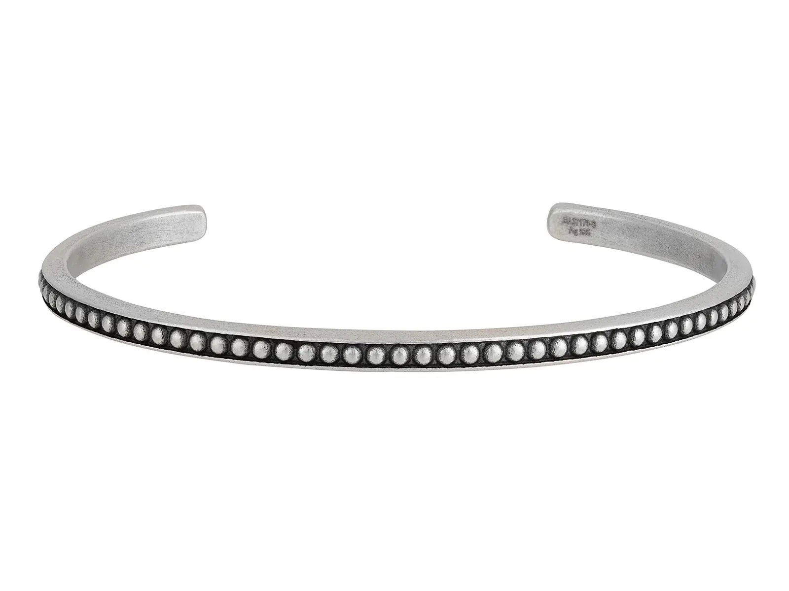 This sterling silver cuff bracelet features rivets encircling the design for a strong, industrial style. Its bold look makes it a perfect accessory for everyday wear or special occasions.-Sterling silver-Diameter 63x46mmItem# 800-2000053 Riveted Silver Cuff
