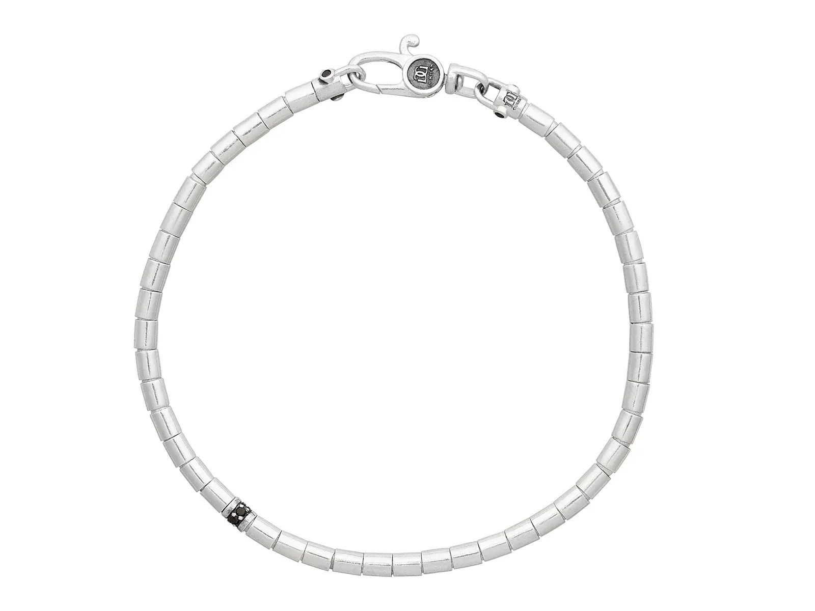 This sterling silver bracelet features black diamonds and a single pavé station for a clean, masculine design. It’s a versatile piece that adds a subtle edge whether worn alone or stacked.-Sterling silver-Black diamonds, 0.15cts-3.4mm Smooth beads-Length 8"Item# 800-2000055 Silver Bracelet with Single Pavé Station