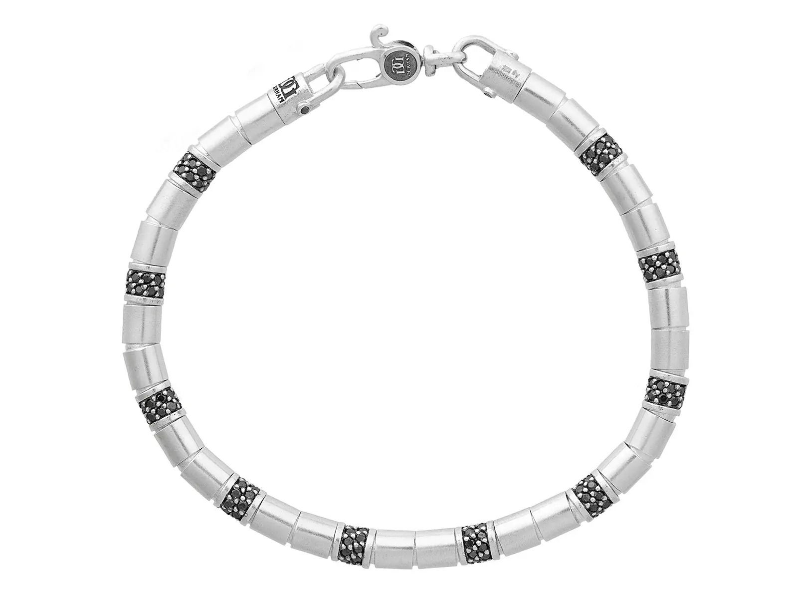 This sterling silver bracelet features black diamonds, pavé stations, and sleek tube beads for a bold yet refined look. Its single-strand design makes it perfect for wearing solo or layered with your favorites.-Sterling silver-Black diamonds, 2.02cts-Length 8.25"Item# 800-2000057 Silver Bracelet with Pavé Stations