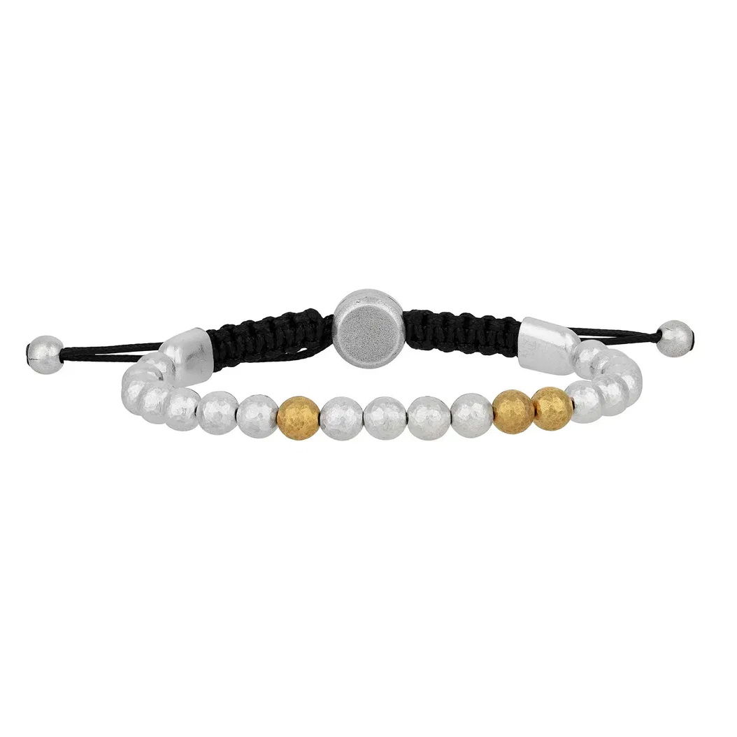 This sterling silver bracelet with an adjustable cord offers effortless style and a perfect fit. Its sleek and versatile design makes it a go-to accessory for any occasion.-Sterling silver-6mm Hammered balls-Adjustable cord, length 6.5-10"Item# 800-2000058 Silver Beaded Bracelet