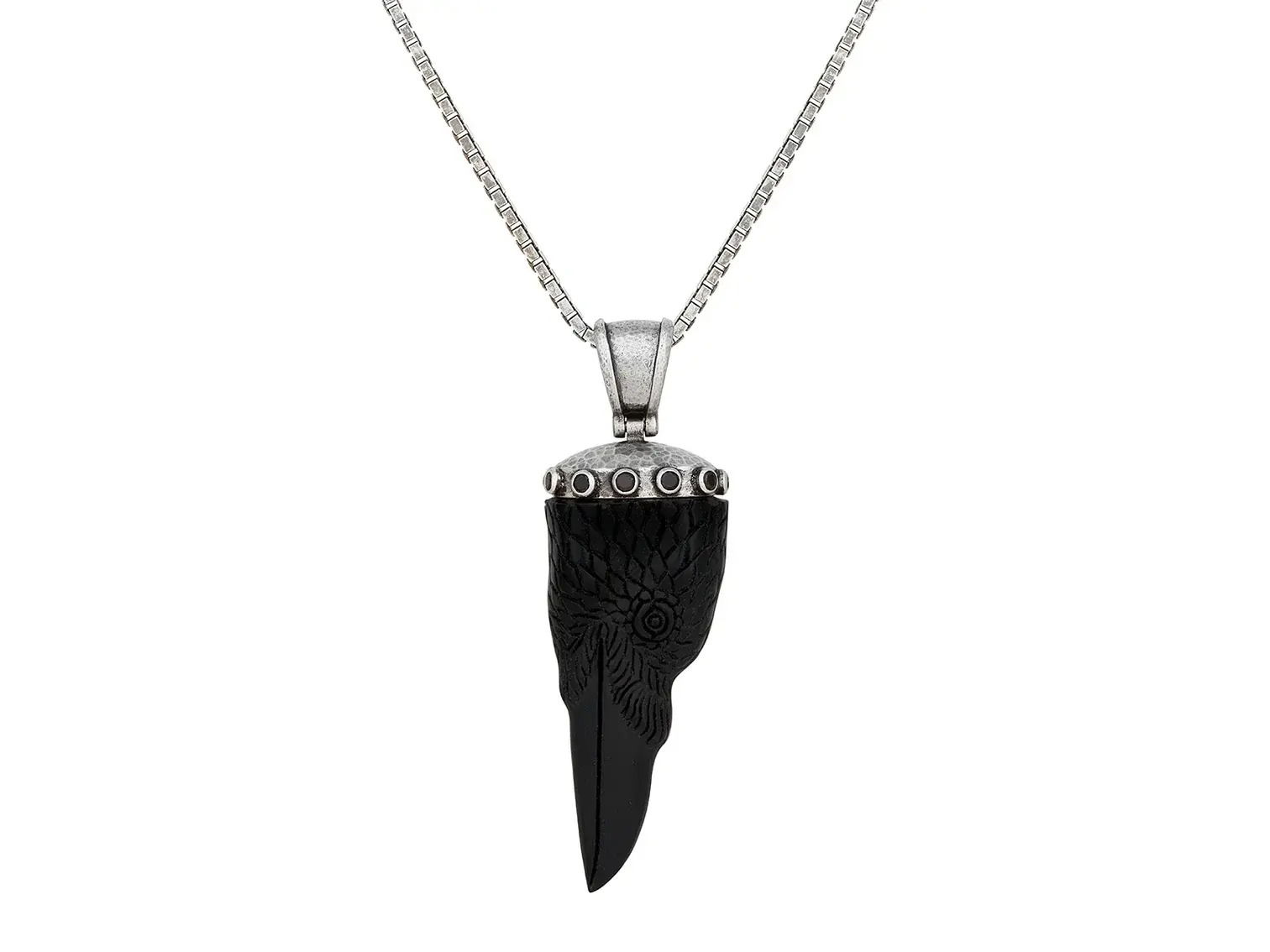 This sterling silver necklace, accented with black diamonds, offers a sleek and modern edge. Whether worn alone or layered, it’s a versatile piece that elevates any style.-Ebony pendant-Sterling silver-Black diamonds, 0.78 carats-46x21mm-Length, 18-20"Item# 800-2000068 Carved Bird Pendant