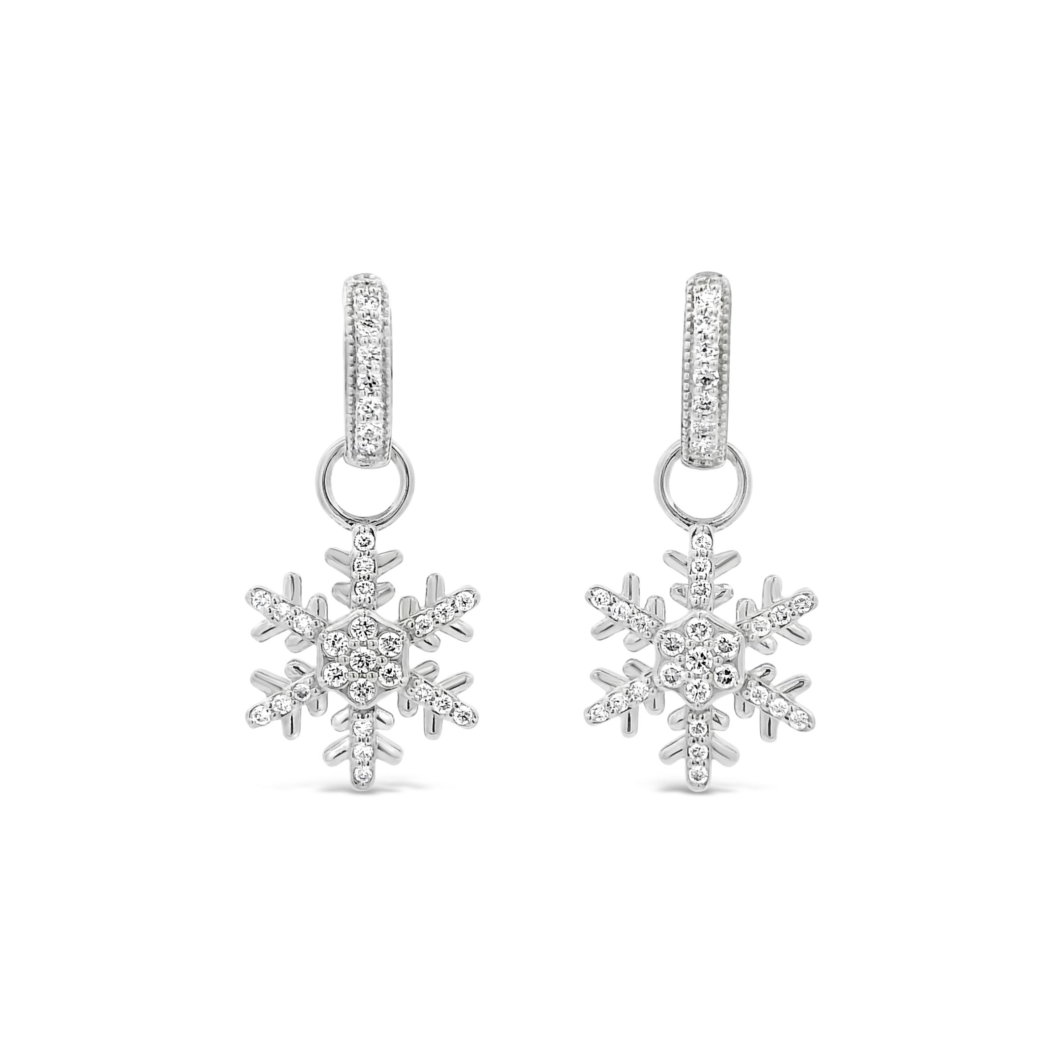 Enjoy the magic of a winter wonderland all year round with exclusive snowflake earring charms designed by Valerie Naifeh. Huggies sold separately.-14k White gold-Diamonds, 0.35ctsItem# SF-ELL2479-14WD Snowflake Charms in White Gold with Diamonds