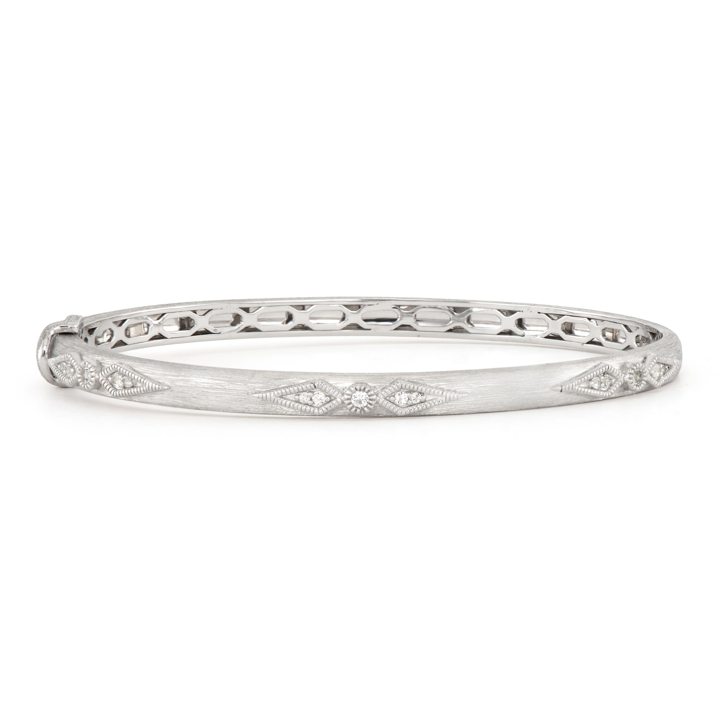 Combining classic elegance with on trend shapes and styles, JFJ offers something for women of all ages. This versatile bangle is designed to be worn alone for a sleek statement or stacked with others for a layered look. Its timeless elegance makes it a perfect addition to any jewelry collection.-Sterling silver-White topaz, 0.16ctsItem# 808-2000251 Silver and Topaz Elongated Kite Bangle