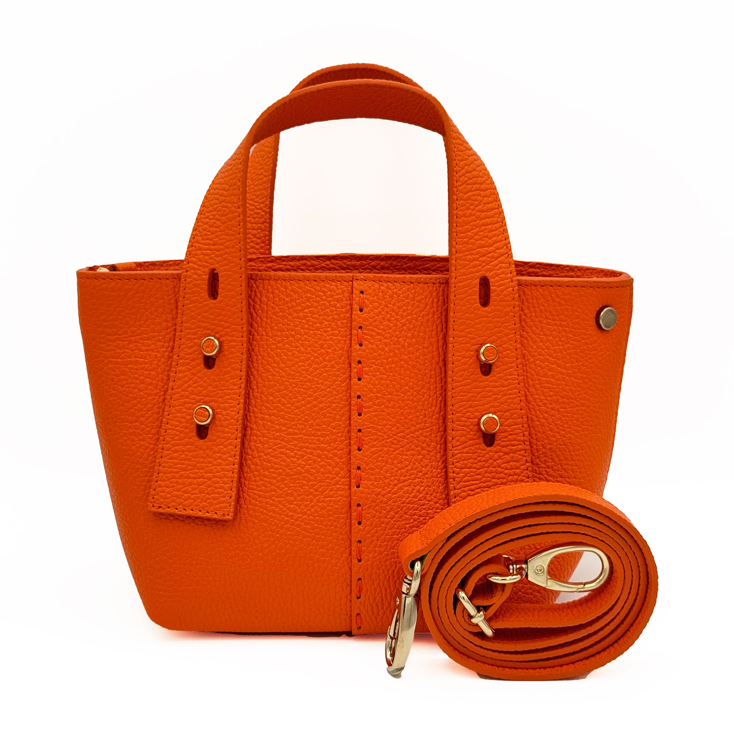 Valerie Naifeh’s line of leather goods features handcrafted handbags and accessories made in Greece from genuine cervo calf leather and natural mink or fox fur. Each piece combines luxurious materials with Valerie’s personally curated color palette for a distinct and elevated look.-Leather-Color: OrangeItem# ND-FUR-00003 Ellie - Leather