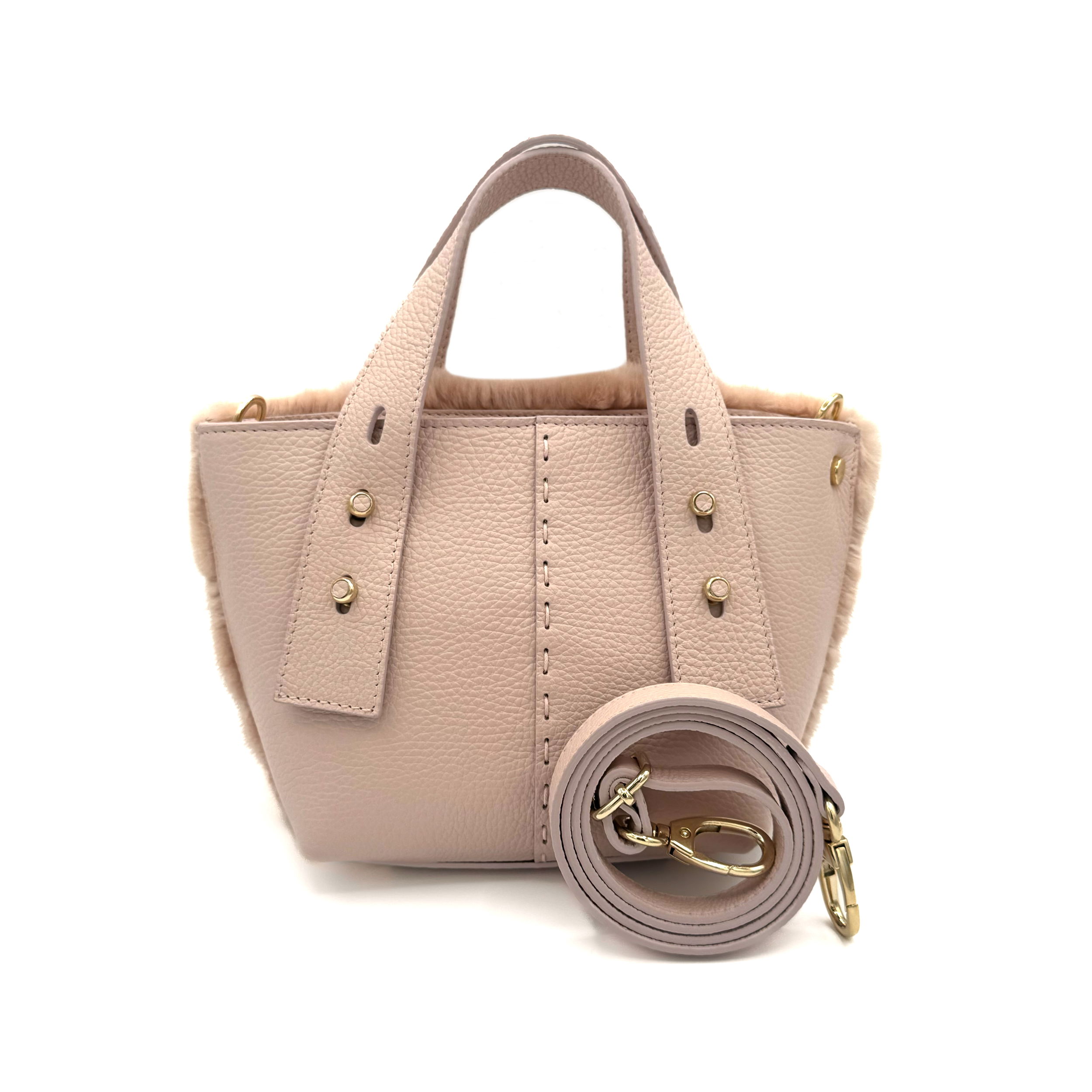 Valerie Naifeh’s line of leather goods features handcrafted handbags and accessories made in Greece from genuine cervo calf leather and natural mink or fox fur. Each piece combines luxurious materials with Valerie’s personally curated color palette for a distinct and elevated look.-Leather-Mink fur-Color: PinkItem# ND-FUR-00007 Ellie - Leather & Mink