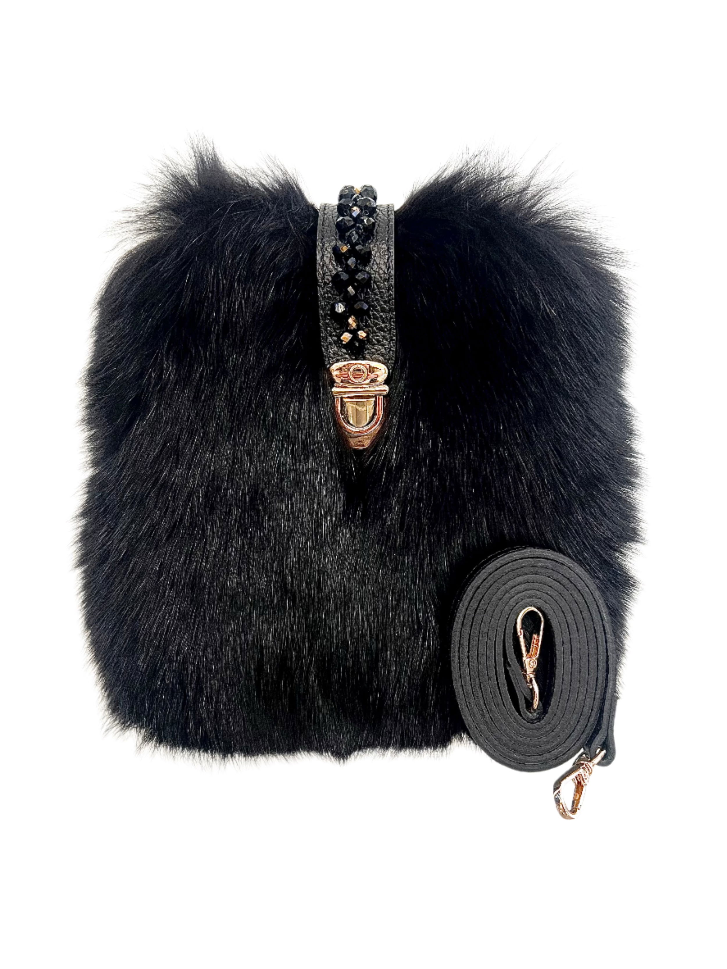 Valerie Naifeh’s line of leather goods features handcrafted handbags and accessories made in Greece from genuine cervo calf leather and natural mink or fox fur. Each piece combines luxurious materials with Valerie’s personally curated color palette for a distinct and elevated look.-Leather-Fox fur-Color: BlackItem# ND-FUR-00012 Erin - Leather & Fox Crossbody