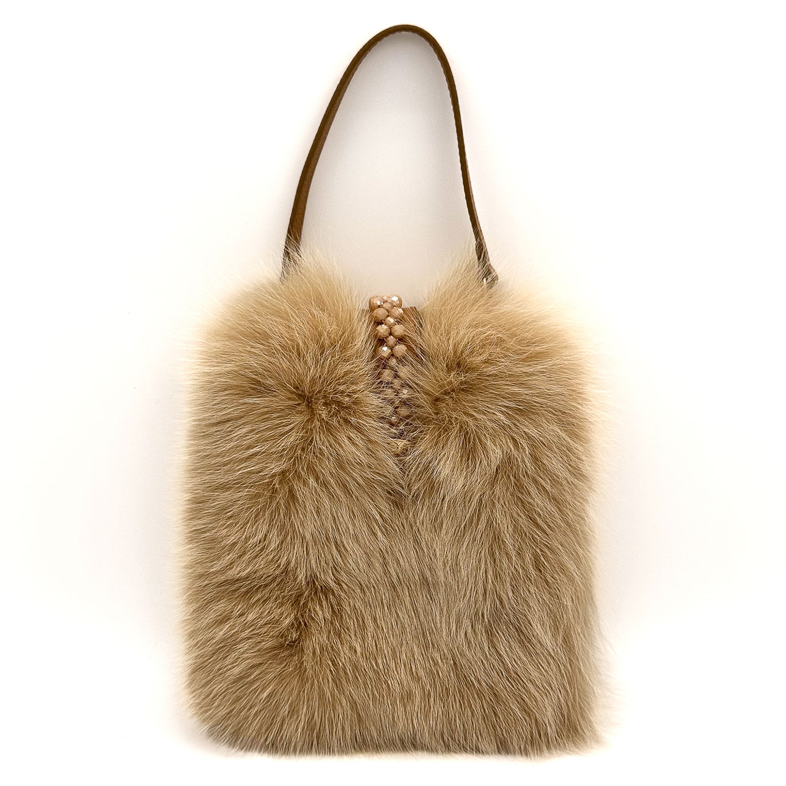 Valerie Naifeh’s line of leather goods features handcrafted handbags and accessories made in Greece from genuine cervo calf leather and natural mink or fox fur. Each piece combines luxurious materials with Valerie’s personally curated color palette for a distinct and elevated look.-Leather-Fox fur-Color: Light beigeItem# ND-FUR-00013 Erin - Leather & Fox Crossbody