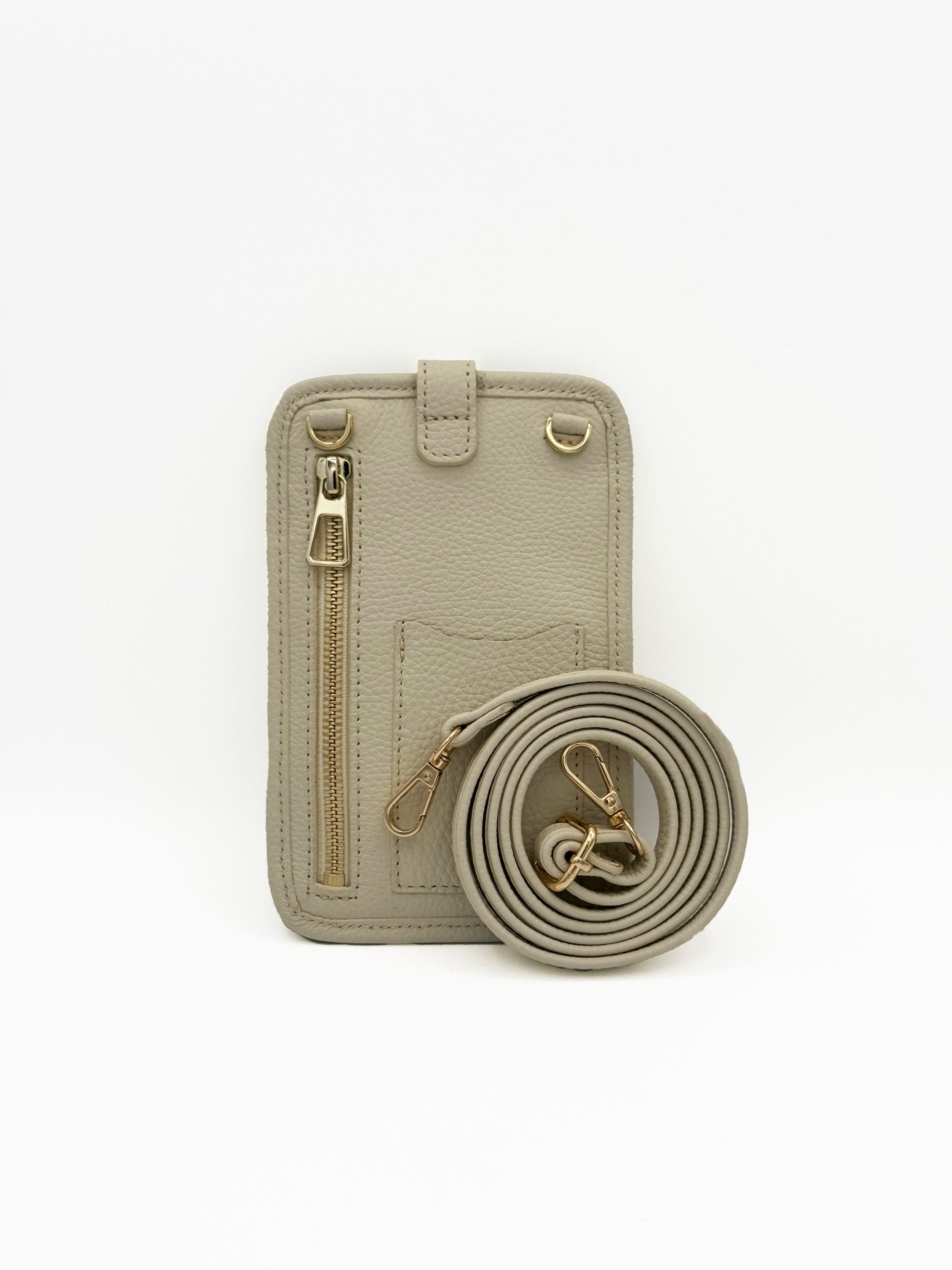 Valerie Naifeh’s line of leather goods features handcrafted handbags and accessories made in Greece from genuine cervo calf leather and natural mink or fox fur. Each piece combines luxurious materials with Valerie’s personally curated color palette for a distinct and elevated look.-Leather-Mink fur-Color: Light beigeItem# ND-FUR-00026 ZOE - Crossbody Phone Holster