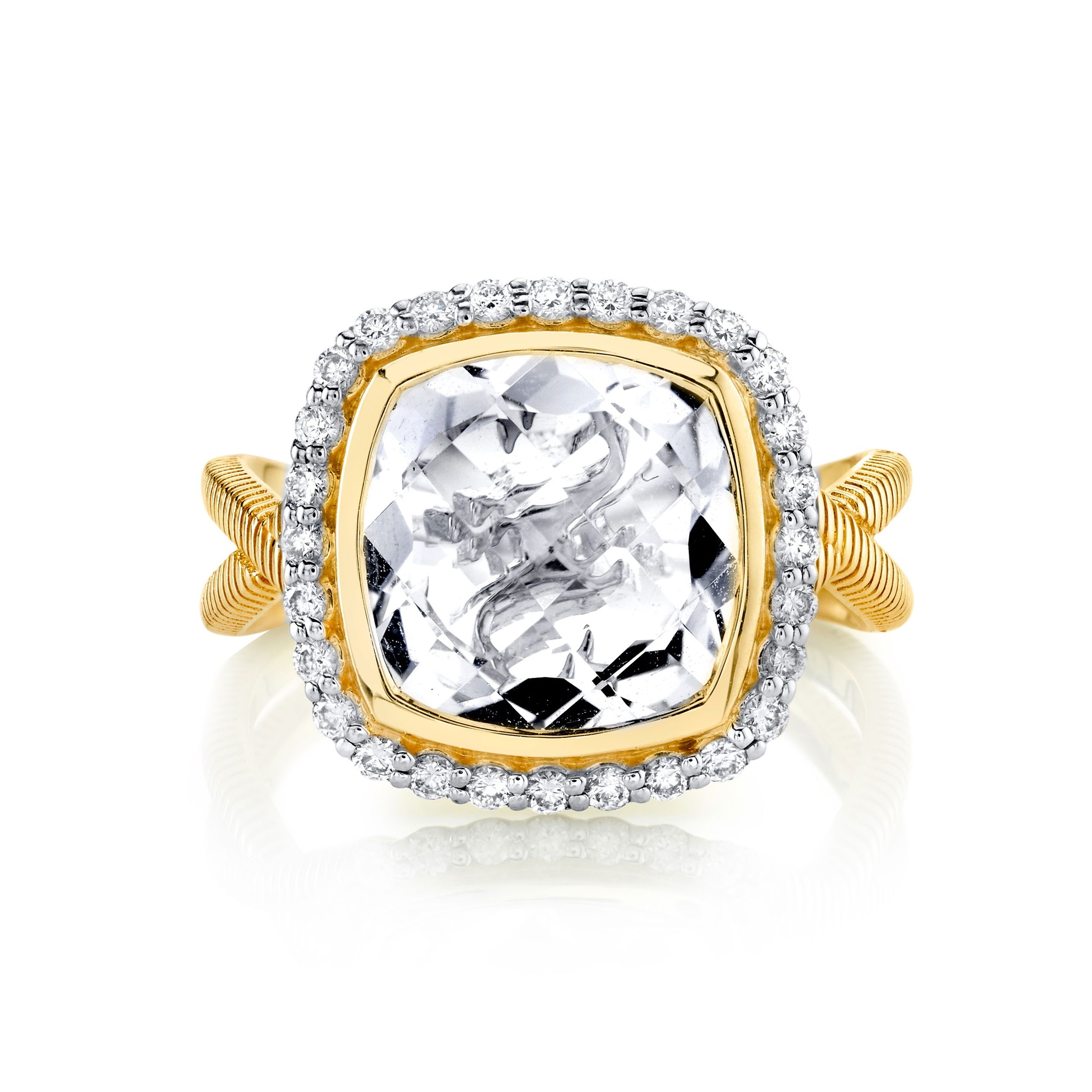 This piece, with a classic design and a modern twist, allows for daily wear and for special occasions. -18k Yellow gold-White topaz, 5.11cts-Round diamonds, 0.28ctsItem# 804-2000248 Cushion White Topaz Ring