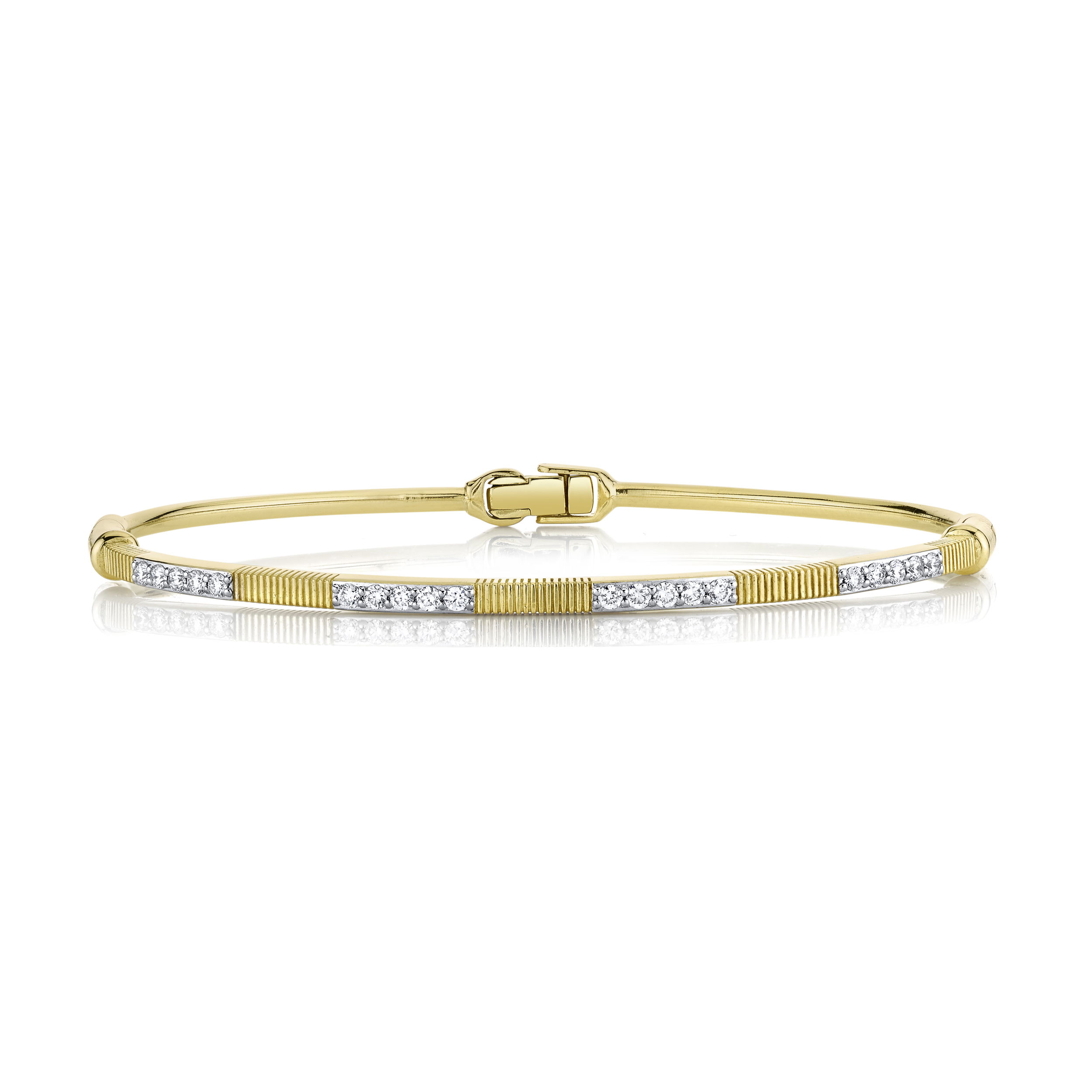 Specifically designed for versatility, this bracelet can be worn on its own or in a stack, making it the perfect addition to any collection.-18k Yellow gold-Round diamonds, 0.47ctsItem# 808-2000258 Strie & White Diamond Bracelet