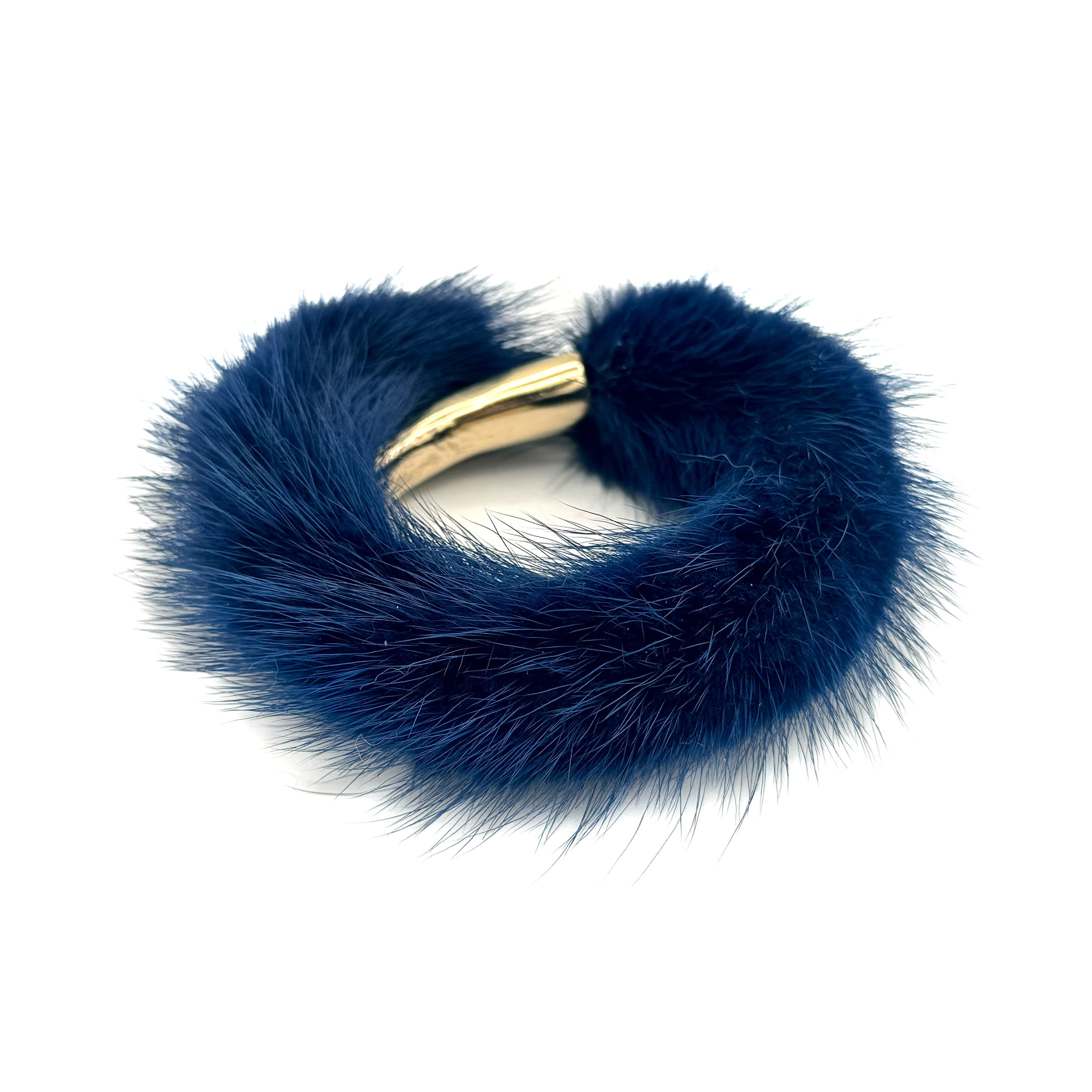 Valerie Naifeh’s line of leather goods features handcrafted handbags and accessories made in Greece from genuine cervo calf leather and natural mink or fox fur. Each piece combines luxurious materials with Valerie’s personally curated color palette for a distinct and elevated look.-Mink fur-Color: BlueItem# ND-FUR-00032 Mink Fur Wristband