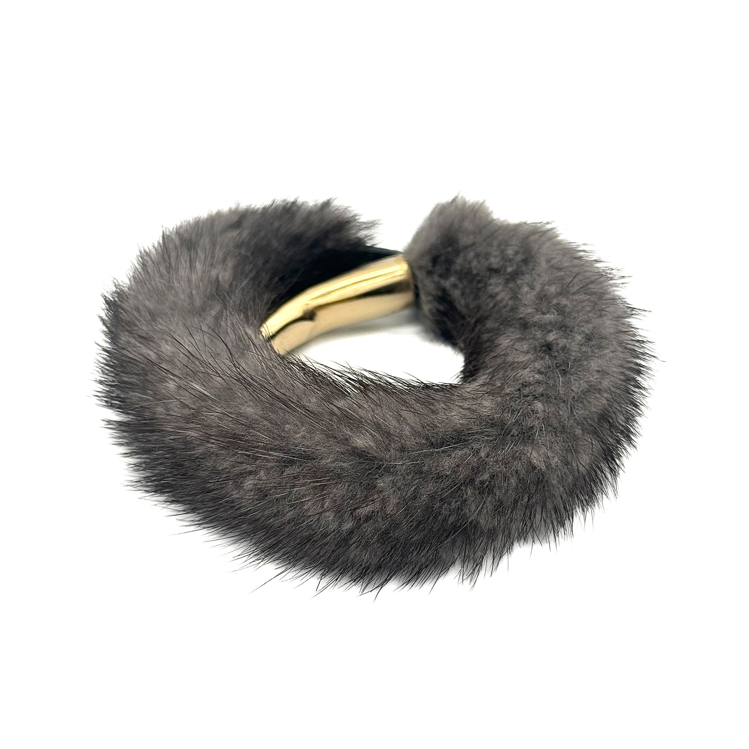 Valerie Naifeh’s line of leather goods features handcrafted handbags and accessories made in Greece from genuine cervo calf leather and natural mink or fox fur. Each piece combines luxurious materials with Valerie’s personally curated color palette for a distinct and elevated look.-Leather-Mink fur-Color: Dark greyItem# ND-FUR-00035 Mink Fur Wristband