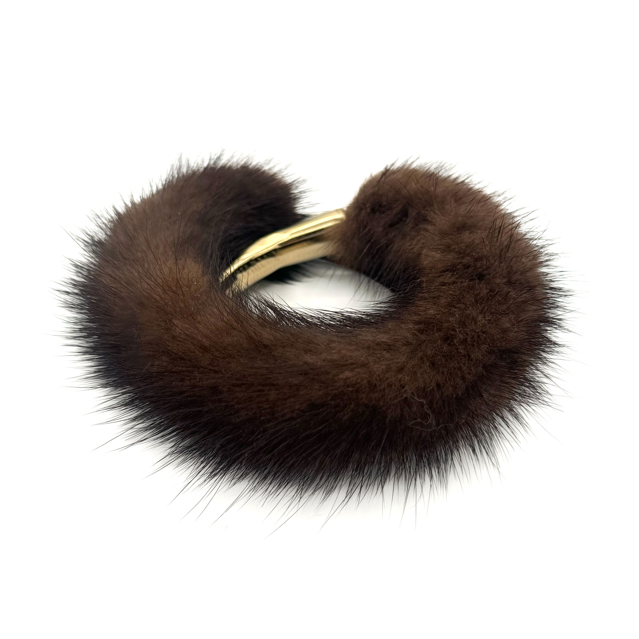 Valerie Naifeh’s line of leather goods features handcrafted handbags and accessories made in Greece from genuine cervo calf leather and natural mink or fox fur. Each piece combines luxurious materials with Valerie’s personally curated color palette for a distinct and elevated look.-Mink-Color: BrownItem# ND-FUR-00037 Mink Fur Wristband