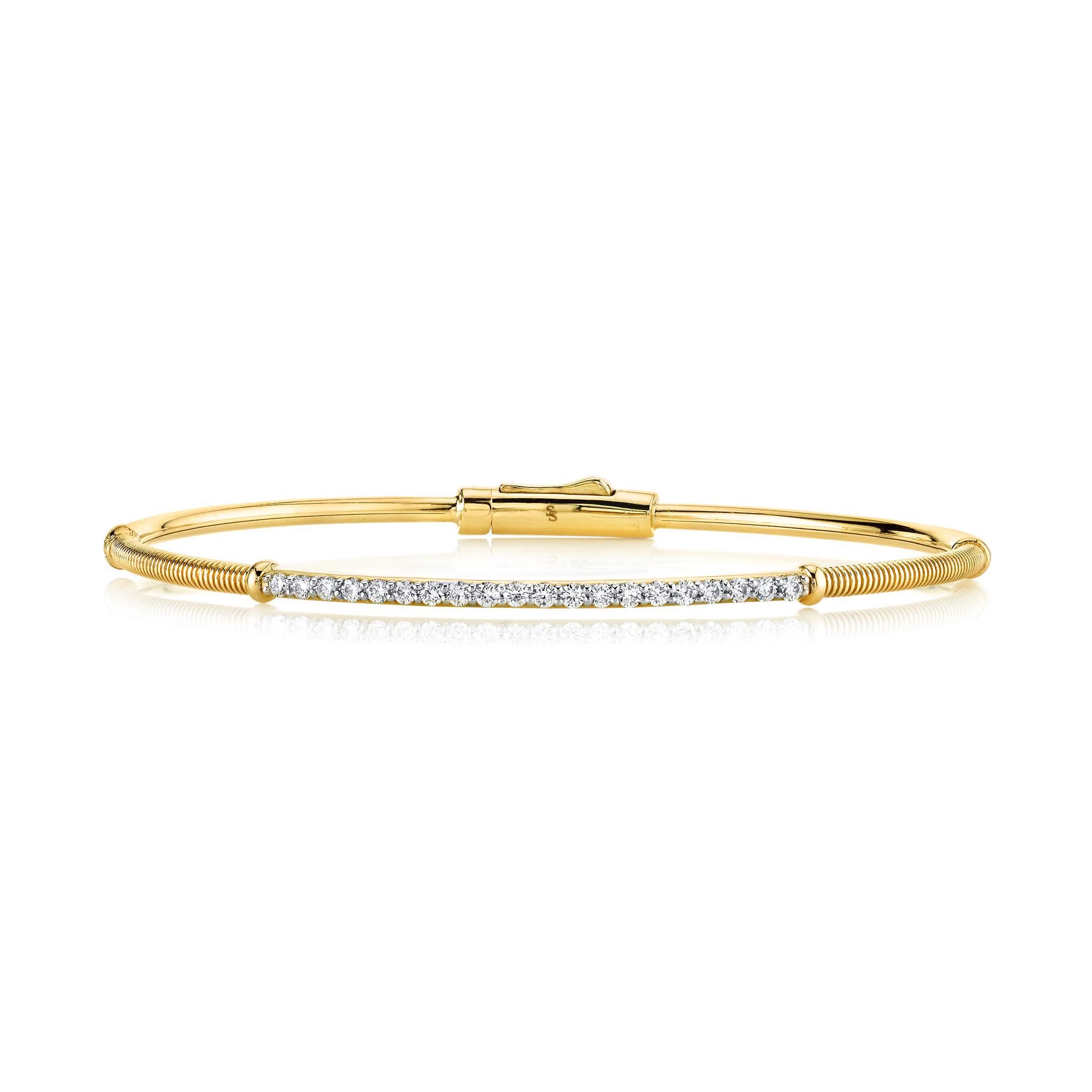 Delicate yet striking, this bracelet is the perfect addition to any stack and a beautiful stand alone piece.-18k Yellow gold-Round diamonds, 0.38ctsItem# 808-2000261 Diamond & Strie Bracelet