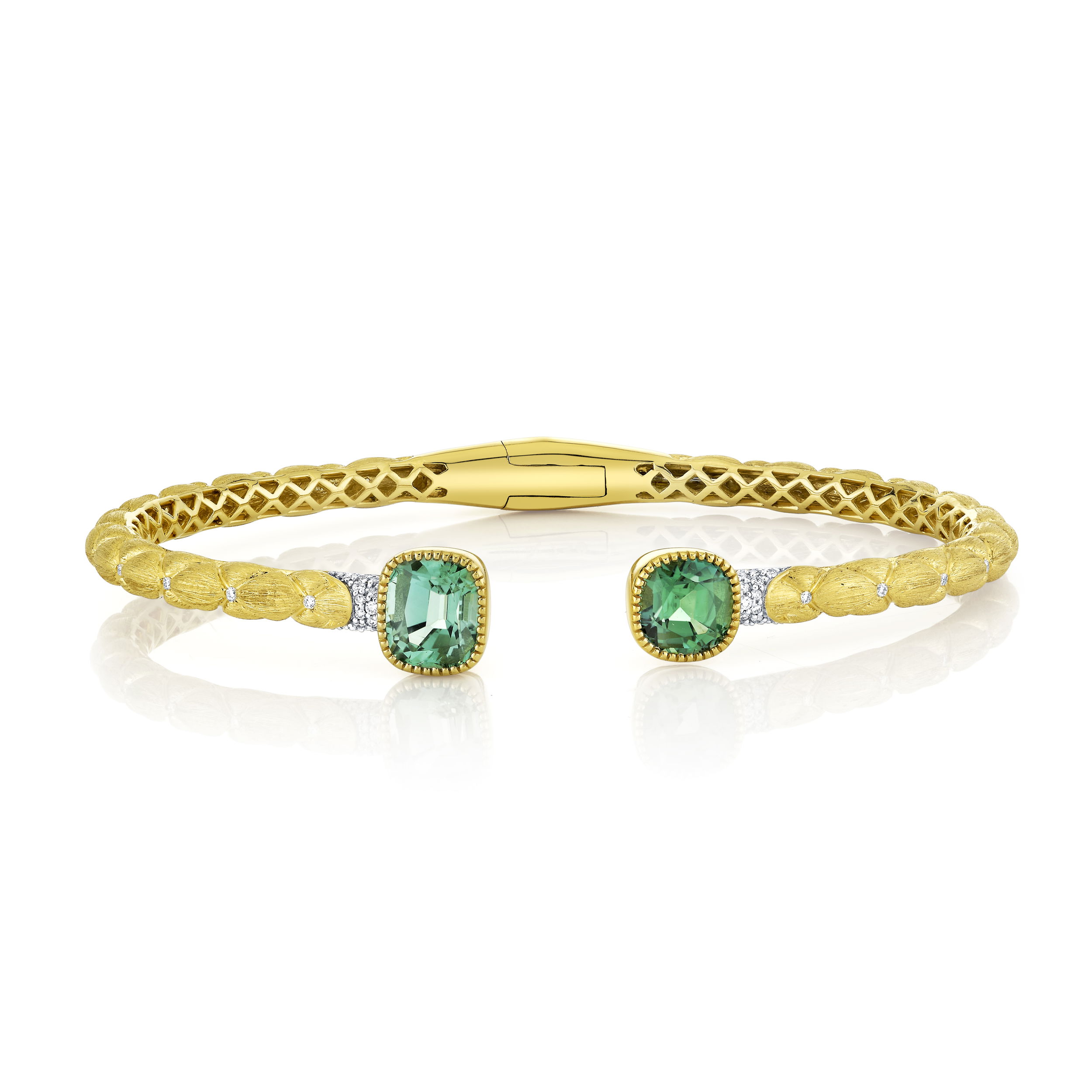 A stunning bracelet with an ability to be worn as in a stack or as a stand alone, this piece truly matches any style.-18k Yellow gold-Green tourmaline, 3.58cts-Round diamonds, 0.23ctsItem# 808-2000265 Quilted Green Tourmaline Bracelet