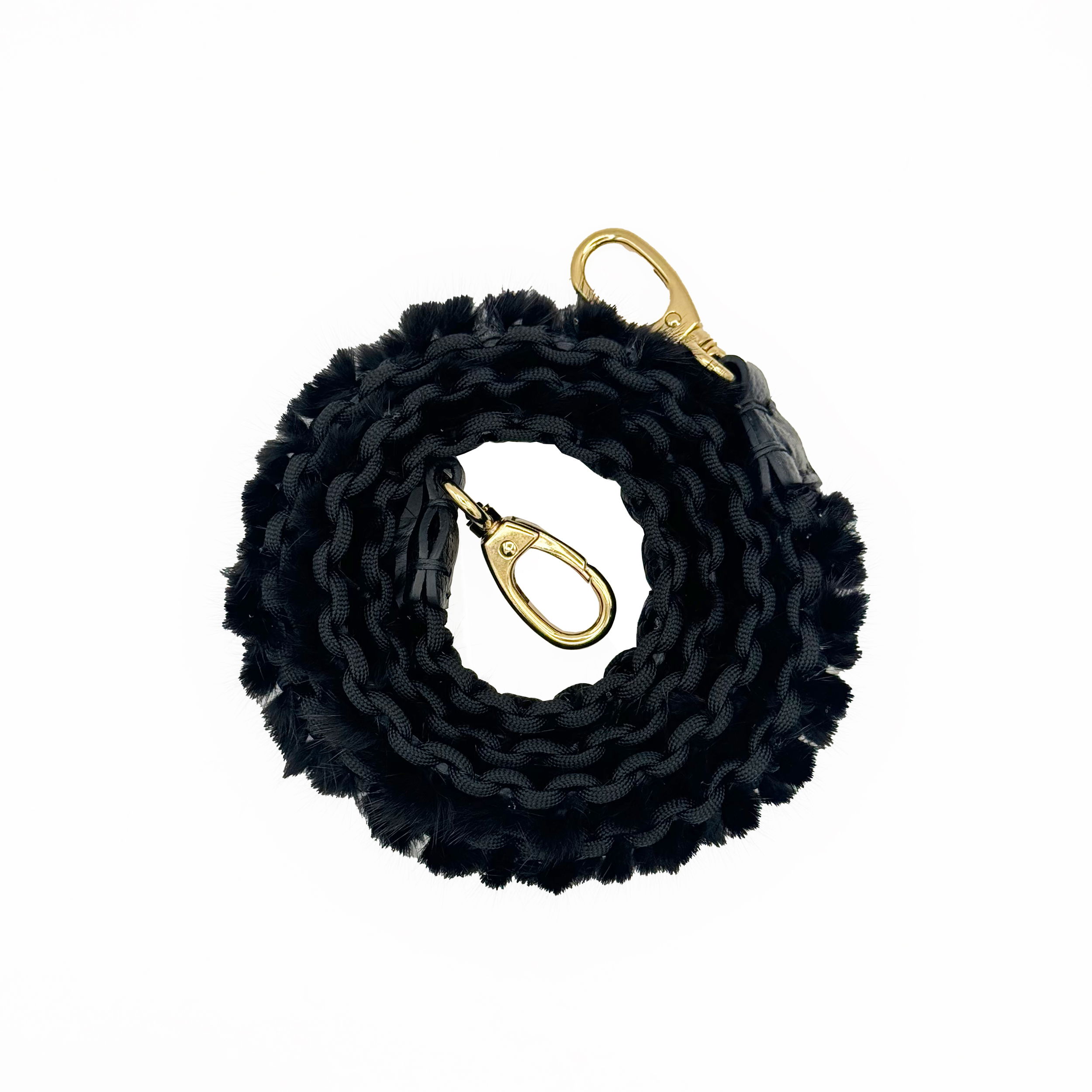 Valerie Naifeh’s line of leather goods features handcrafted handbags and accessories made in Greece from genuine cervo calf leather and natural mink or fox fur. Each piece combines luxurious materials with Valerie’s personally curated color palette for a distinct and elevated look.-Leather-Mink-Color: BlackItem# ND-FUR-00039 Mink Bag Belt