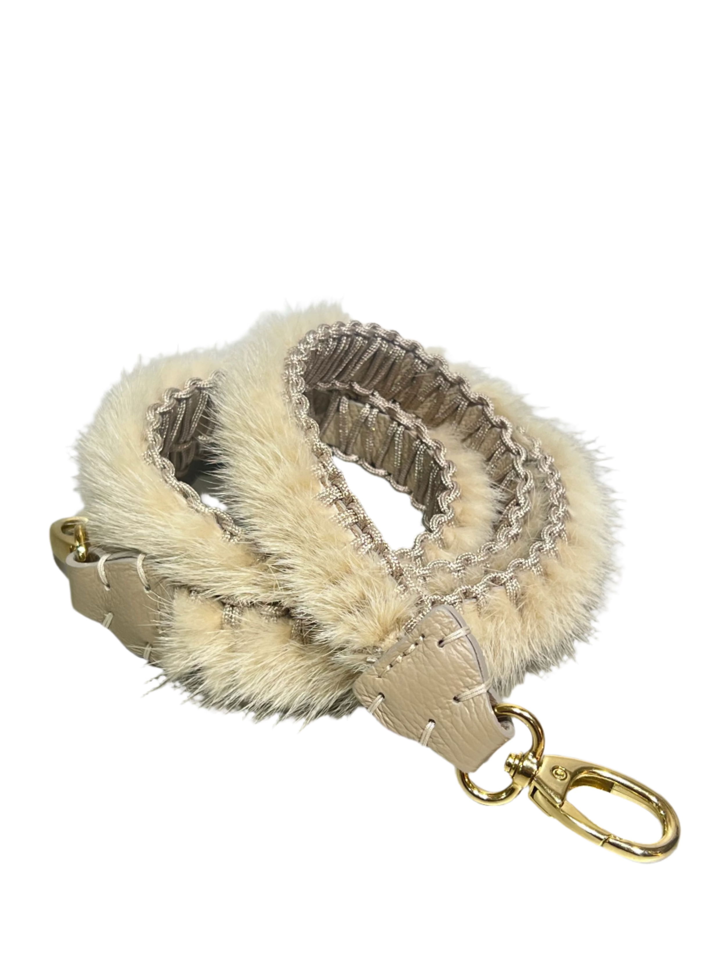 Valerie Naifeh’s line of leather goods features handcrafted handbags and accessories made in Greece from genuine cervo calf leather and natural mink or fox fur. Each piece combines luxurious materials with Valerie’s personally curated color palette for a distinct and elevated look.-Leather-Mink fur-Color: Light beigeItem# ND-FUR-00043 Mink Bag Belt