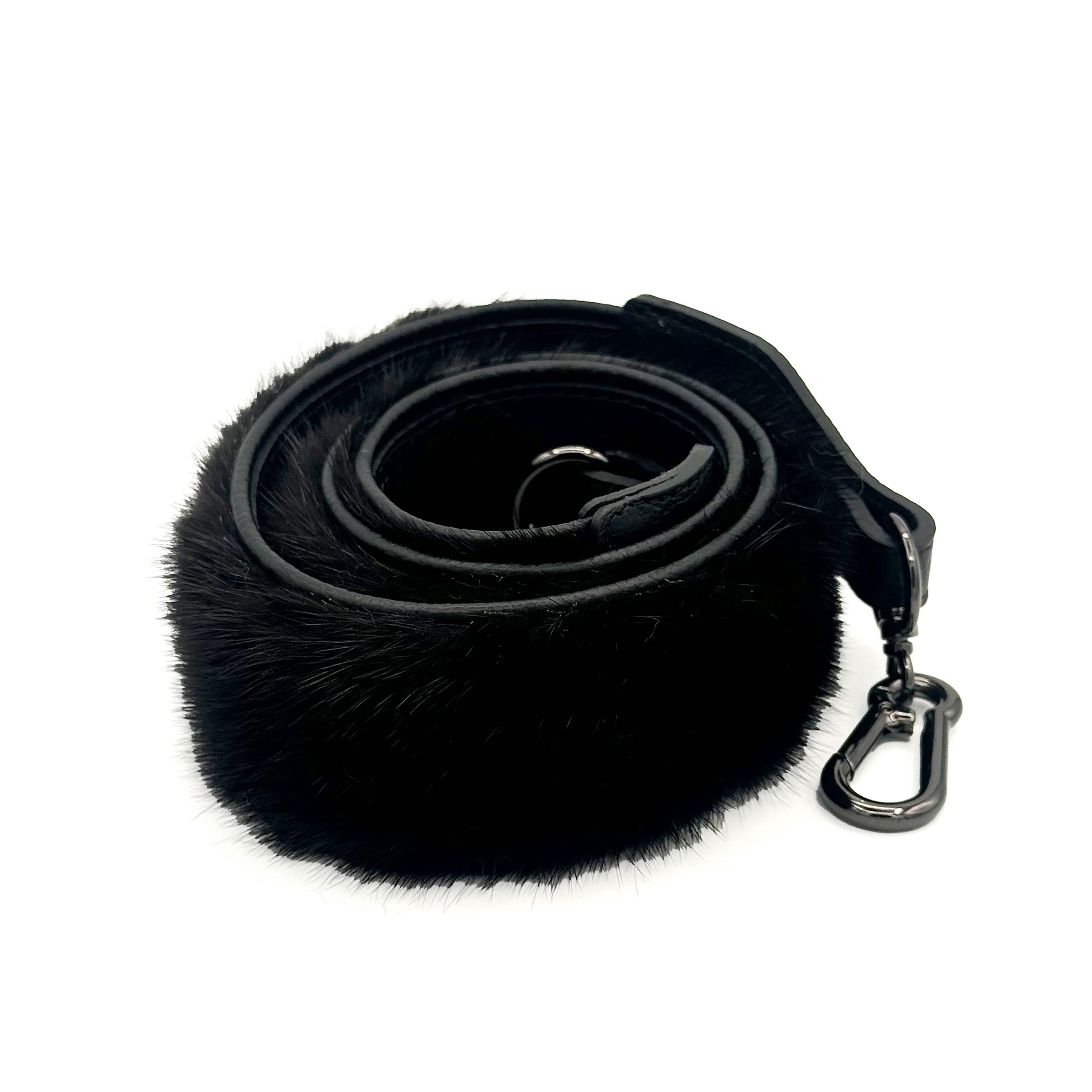 Valerie Naifeh’s line of leather goods features handcrafted handbags and accessories made in Greece from genuine cervo calf leather and natural mink or fox fur. Each piece combines luxurious materials with Valerie’s personally curated color palette for a distinct and elevated look.-Leather-Mink fur-Color: BlackItem# ND-FUR-00044 Mink Bag Belt