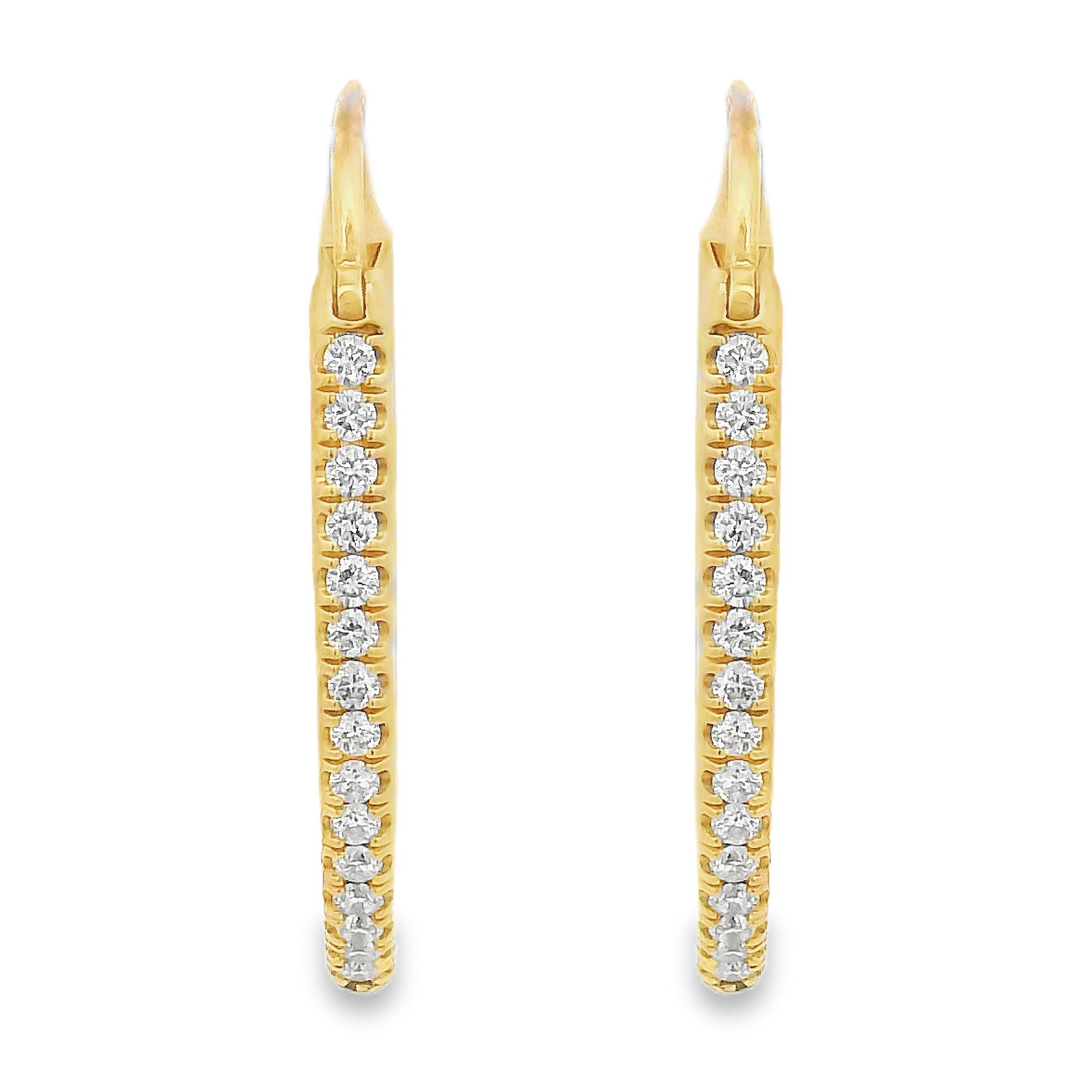 These elegant marquise-shaped hoops in 18k yellow gold are adorned with 0.84cts of sparkling diamonds. Their distinctive silhouette and refined brilliance make them a modern classic—perfect for day or evening wear. Charms sold separately. -18k Yellow gold -Diamonds, F-G/VS 0.84ctsItem# 805-2000443 Mary Marquise Hoops