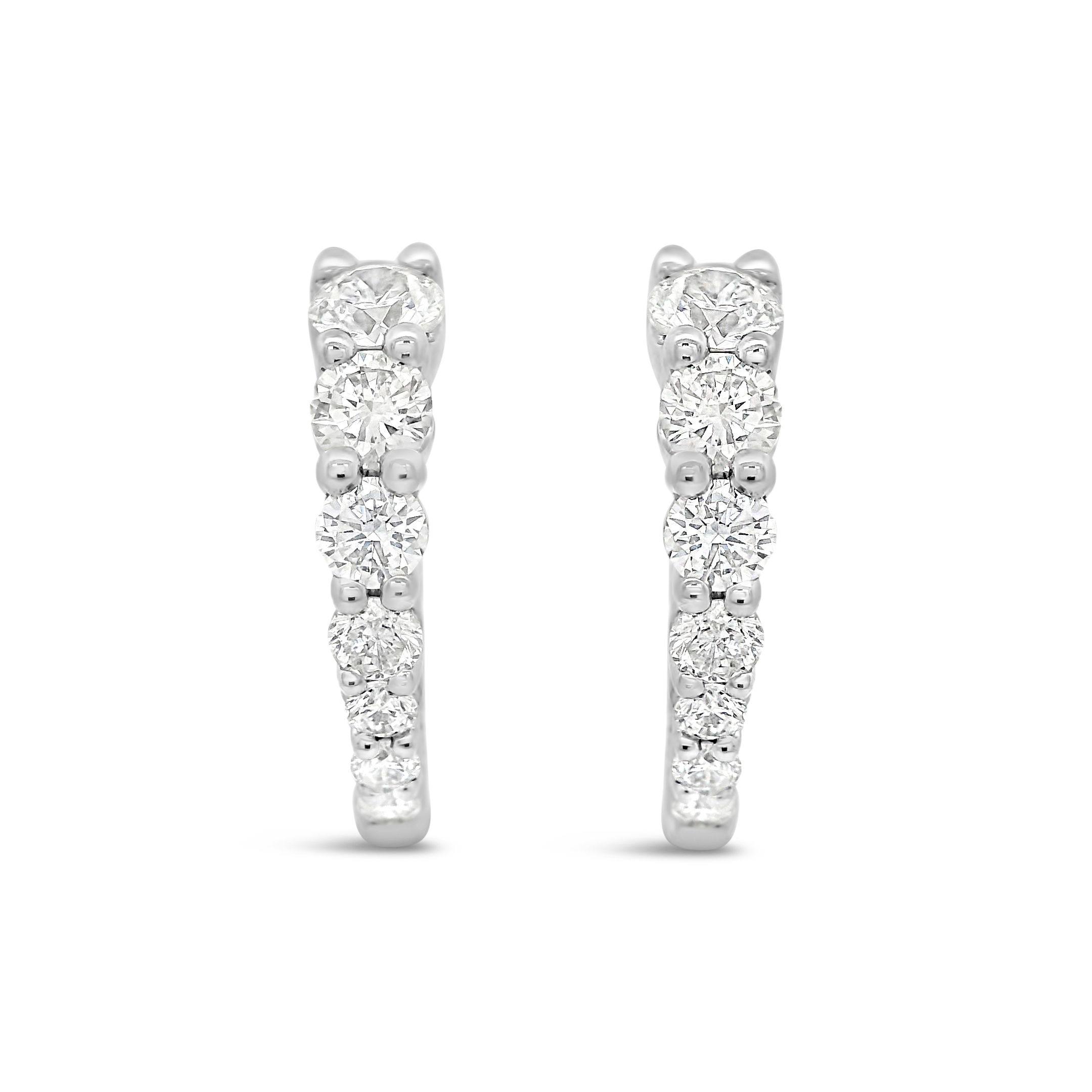 These chic 18k white gold diamond hoop earring are a timeless staple piece. Whether you're at an important event or running errand, these will become your favorite go-to pair of earrings!-18k White gold-Diamonds, 0.74ctsItem# ND-EAR-00025 Diamond Hoop Earrings in White Gold