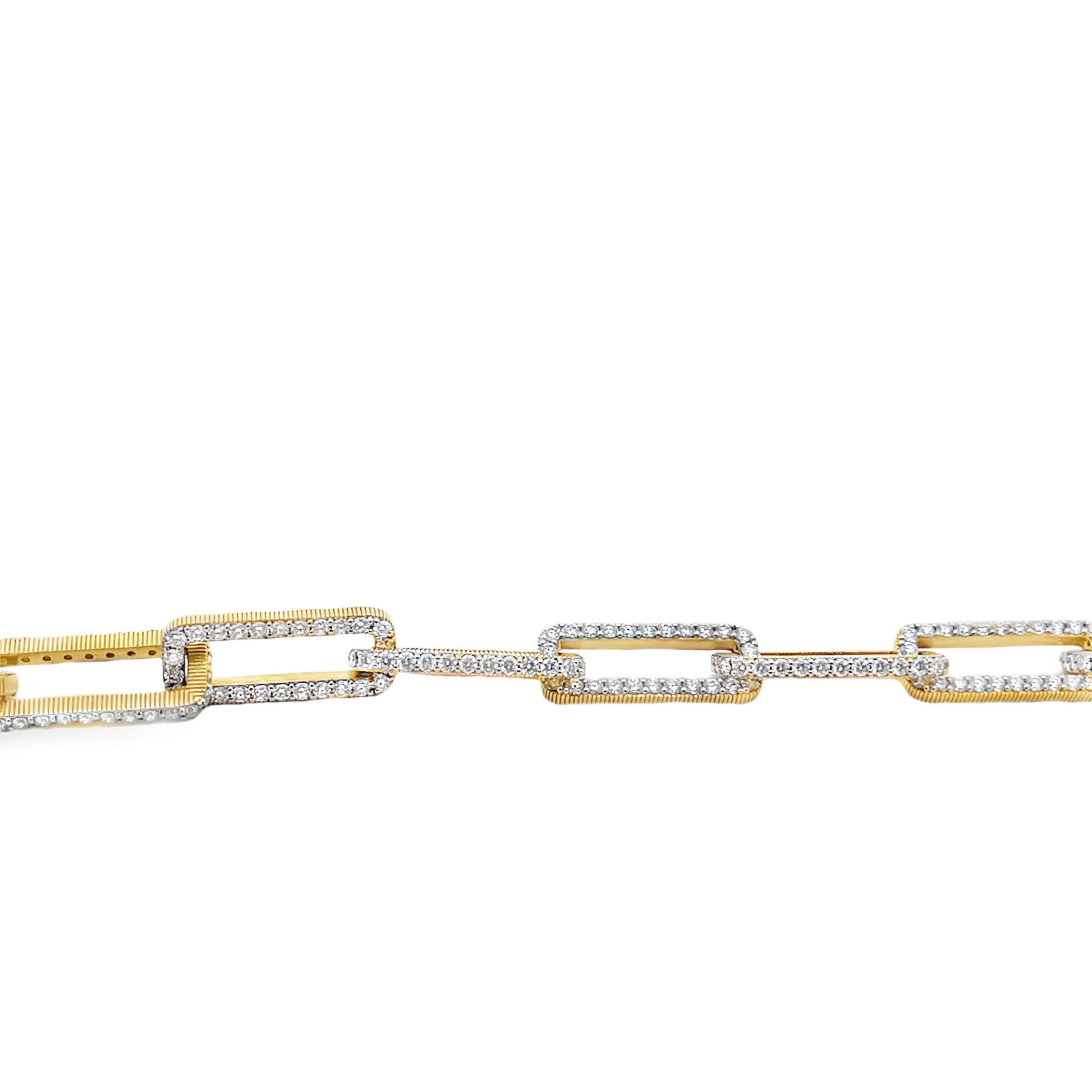 This bracelet features diamonds set within chain links, creating a beautiful statement piece to match any occasion.-18k Yellow gold-Round diamonds, 7ctsItem# 808-2000275 Diamond Wide Link Bracelet