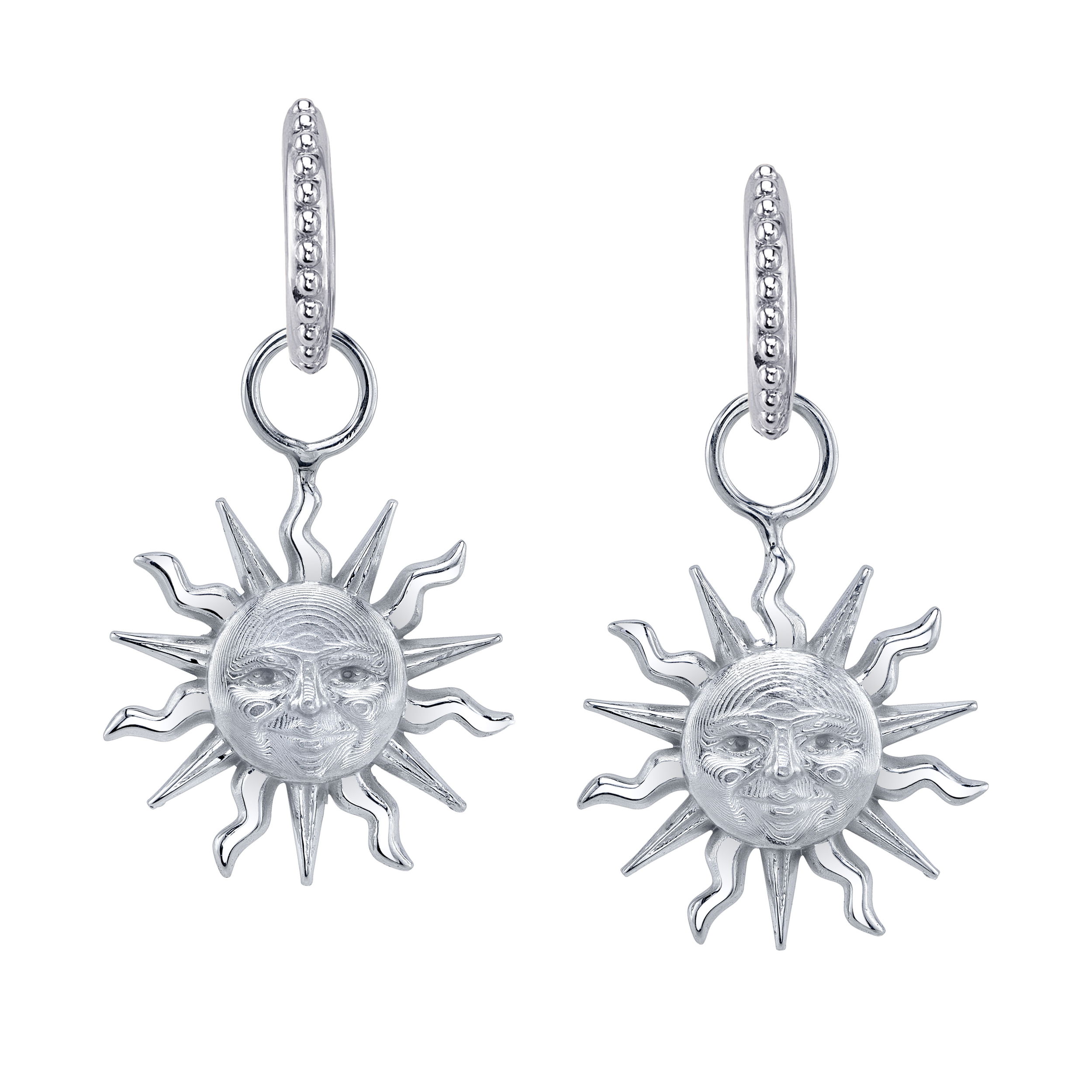 Valerie Naifeh has reimagined the iconic Sun Valley "Sun" design, bringing a modern touch to this timeless symbol. While infusing it with contemporary elegance, she honors its rich heritage, creating a collection that both celebrates the past and looks towards the future. Charms sold separately. -14k White goldItem# SVS01-C585W Sun Valley Sun Earring Charms in White Gold