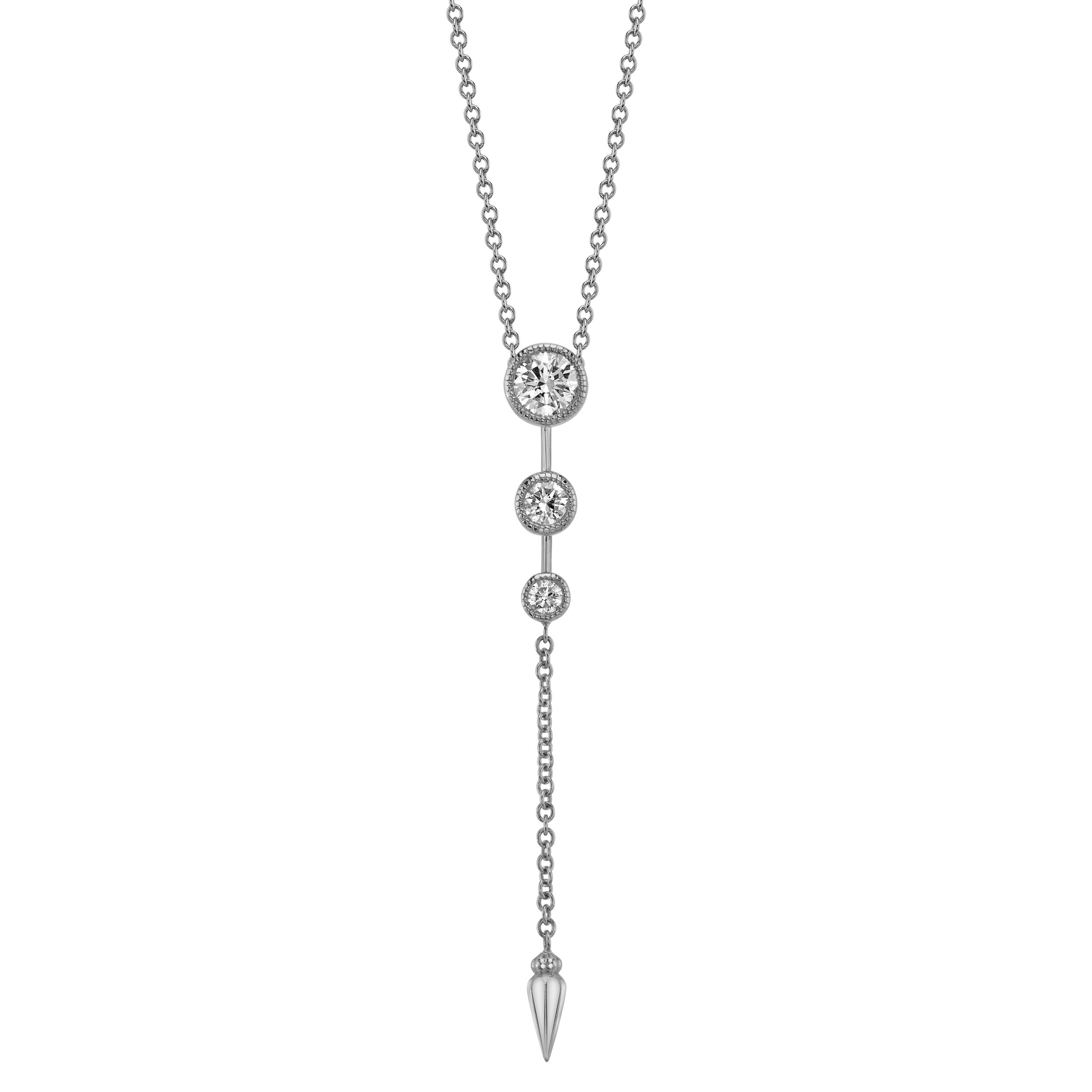 This lariat necklace boasts three round brilliant diamonds set in sleek white gold. A classic timeless piece, perfect for daily wear or special occasion. -14K White gold-Round diamonds, 0.46ctsItem# ND-NK-00013 Diamond Lariat Necklace