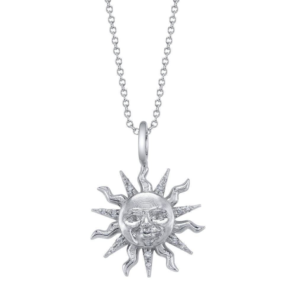 Valerie Naifeh has reimagined the iconic Sun Valley "Sun" design, bringing a modern touch to this timeless symbol. While infusing it with contemporary elegance, she honors its rich heritage, creating a collection that both celebrates the past and looks towards the future. Chain sold separately.-14k White gold-Round Diamonds, 0.06cts-Diameter 17mmItem# SVS01-P585W-D Sun Valley Sun Pendant in White gold with Diamonds