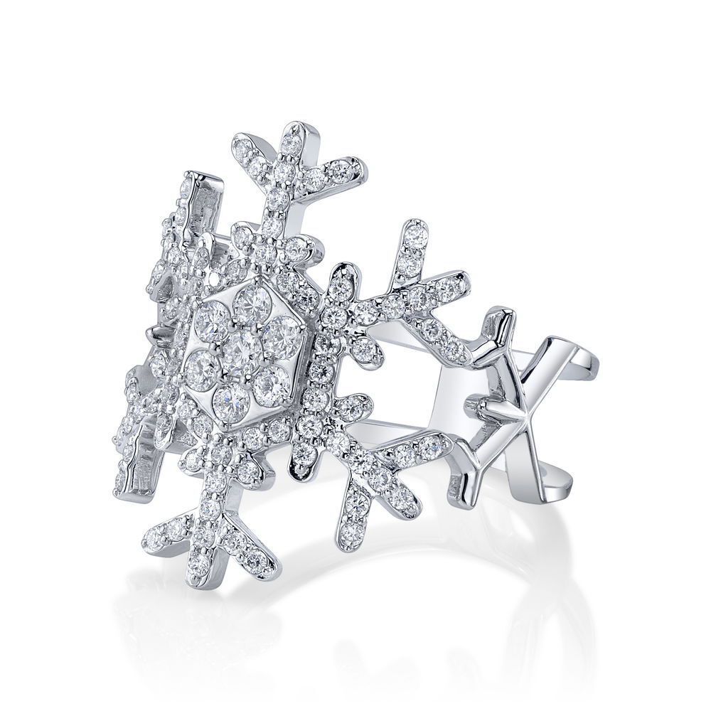 Enjoy the magic of a winter wonderland all year round with an exclusive snowflake ring designed by Valerie Naifeh.-14k White gold-Diamonds, 0.55cts-Size 7Item# SVSF01-R585W-D Snowflake Ring in White Gold with Diamonds