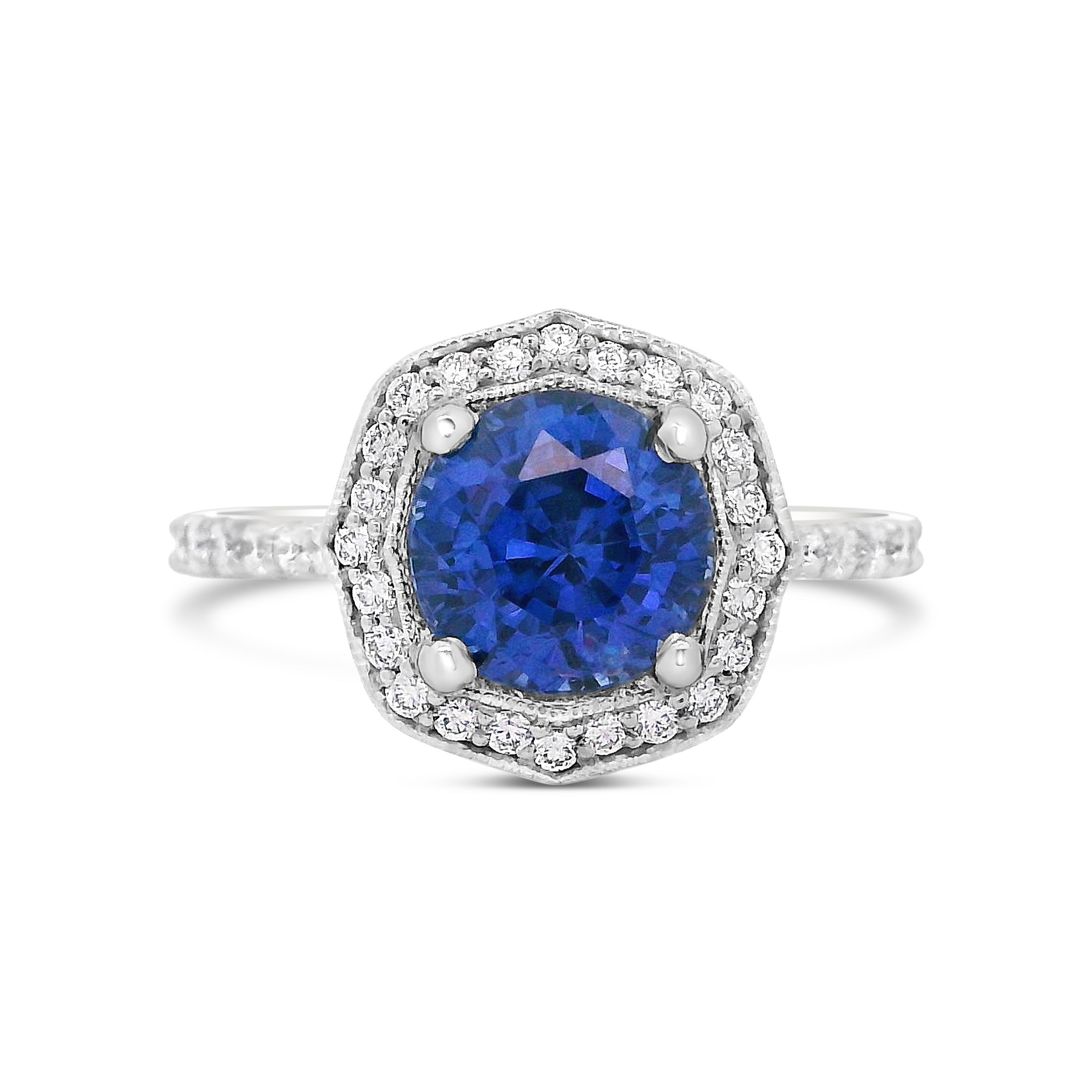 Crafted in platinum, this ring features a vibrant blue sapphire center surrounded by sparkling diamonds. It's a striking piece that adds polish without trying too hard.-Platinum-Blue sapphire, 2.86cts-Diamonds, 1.26ctsItem# 200-2000121 Platinum Sapphire Diamond Ring