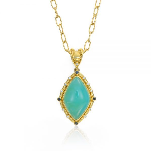 Fabricated in Walla Walla Washington, Zaffiro specializes in Granulation. An Art first appearing 4000 years ago around Italy and Greece. Any of their their pieces will impress as wearable art for any jewelry collector or enthusiast.-22k Yellow gold -Peruvian opal, 5.01cts-Round black diamonds, 0.20cts-Round white diamonds, 0.20ctsItem# 230-2000012 Peruvian Opal Pendant