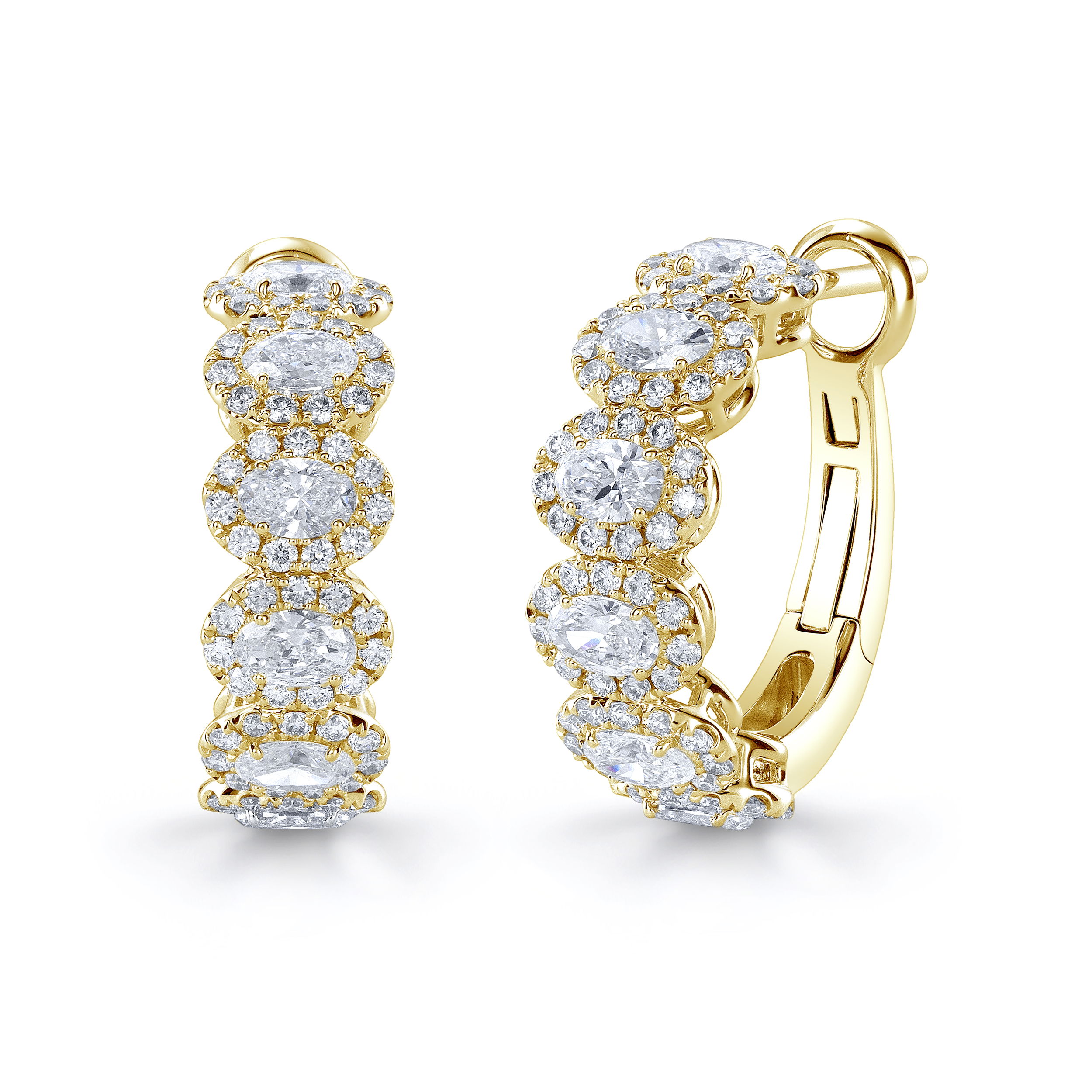 These stunning hoop earrings feature east-to-west oval diamonds, each framed in a sparkling diamond halo. The unique orientation adds a modern twist to a classic silhouette, making them a standout choice for everyday elegance or elevated evenings.-18k Yellow gold-Oval diamonds, 2.37cts-Round diamonds, 1.01ctsItem# 150-2000088 Oval Halo Hoop Earrings