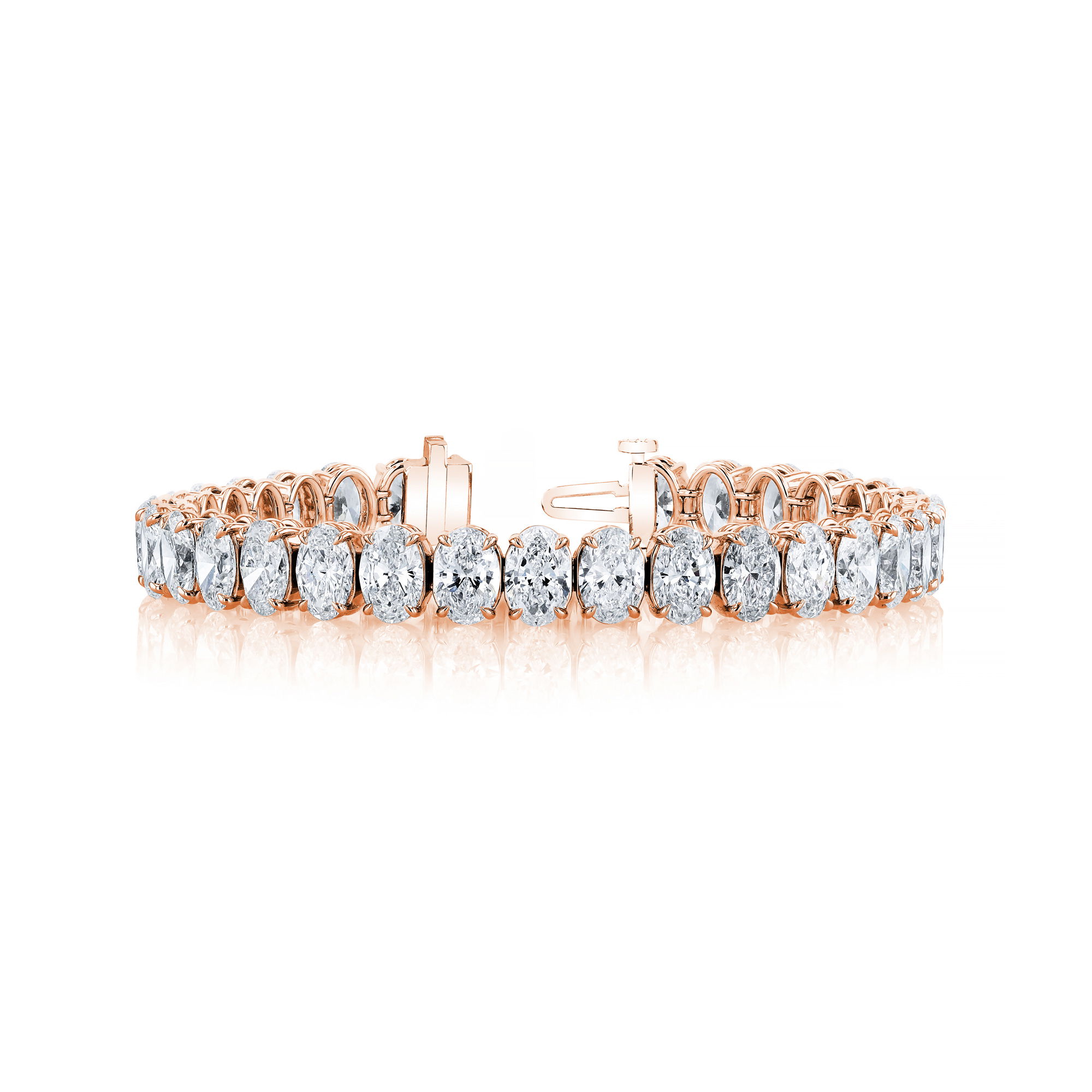 This timeless tennis bracelet showcases a continuous line of oval-cut diamonds, each expertly set to enhance their brilliance and shape. Elegant and versatile, it's the perfect piece to elevate both everyday wear and special occasions.-18k Rose gold-Oval diamonds, 6.02cts-Length 7"Item# 170-2000044 Oval Tennis Bracelet