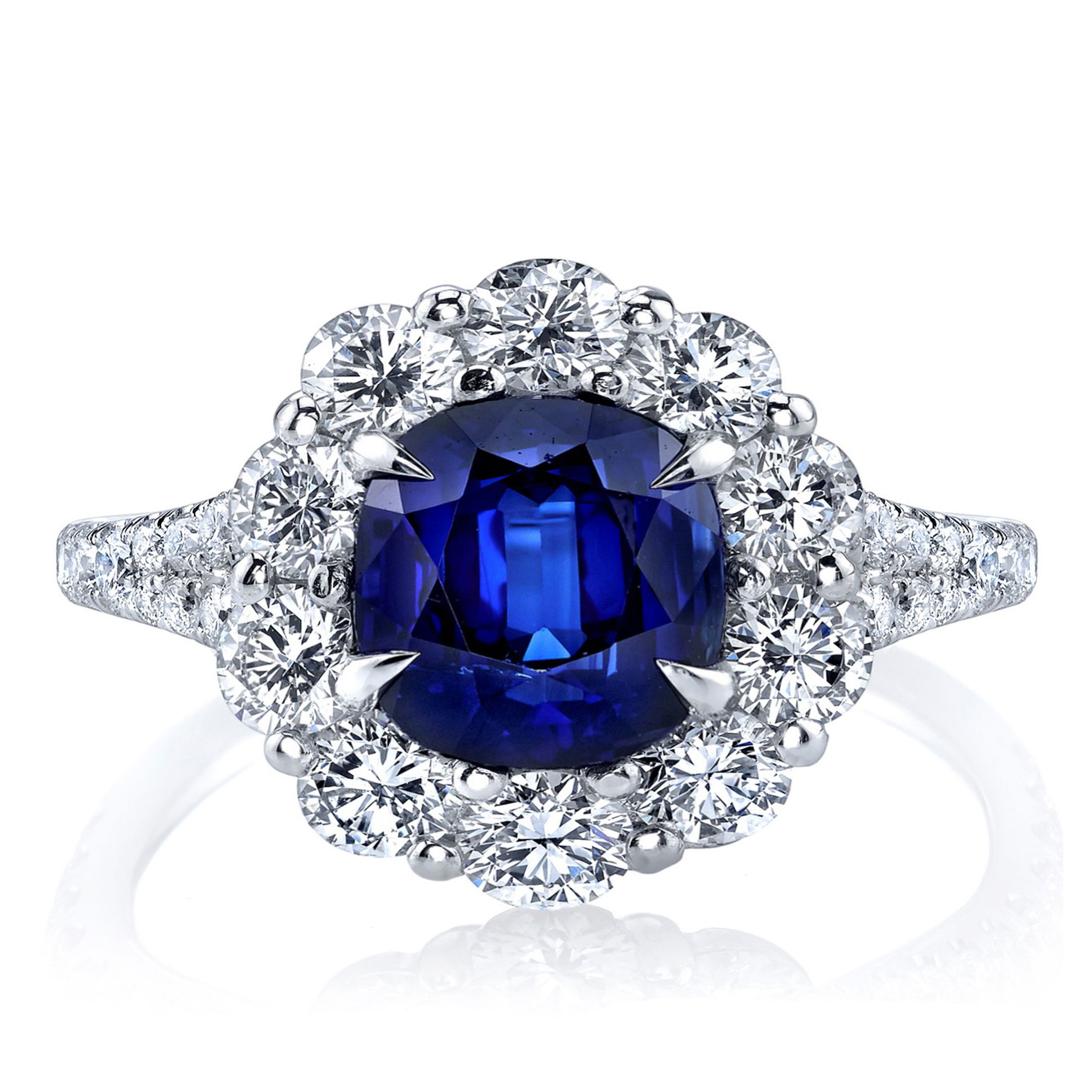 As deep as the ocean and clear as the sky! This blue sapphire ring really captivates its audience, bringing vibrance against the clear round diamond halo cascading down to its split shank. Wear it on special occasions, or make it a daily staple to your collection.-Platinum-Blue Sapphire, 2.53cts-Round diamonds, 1.80cts -Size, 6.5, contact for sizing optionsItem# 200-2000126 Sapphire & Diamond Ring