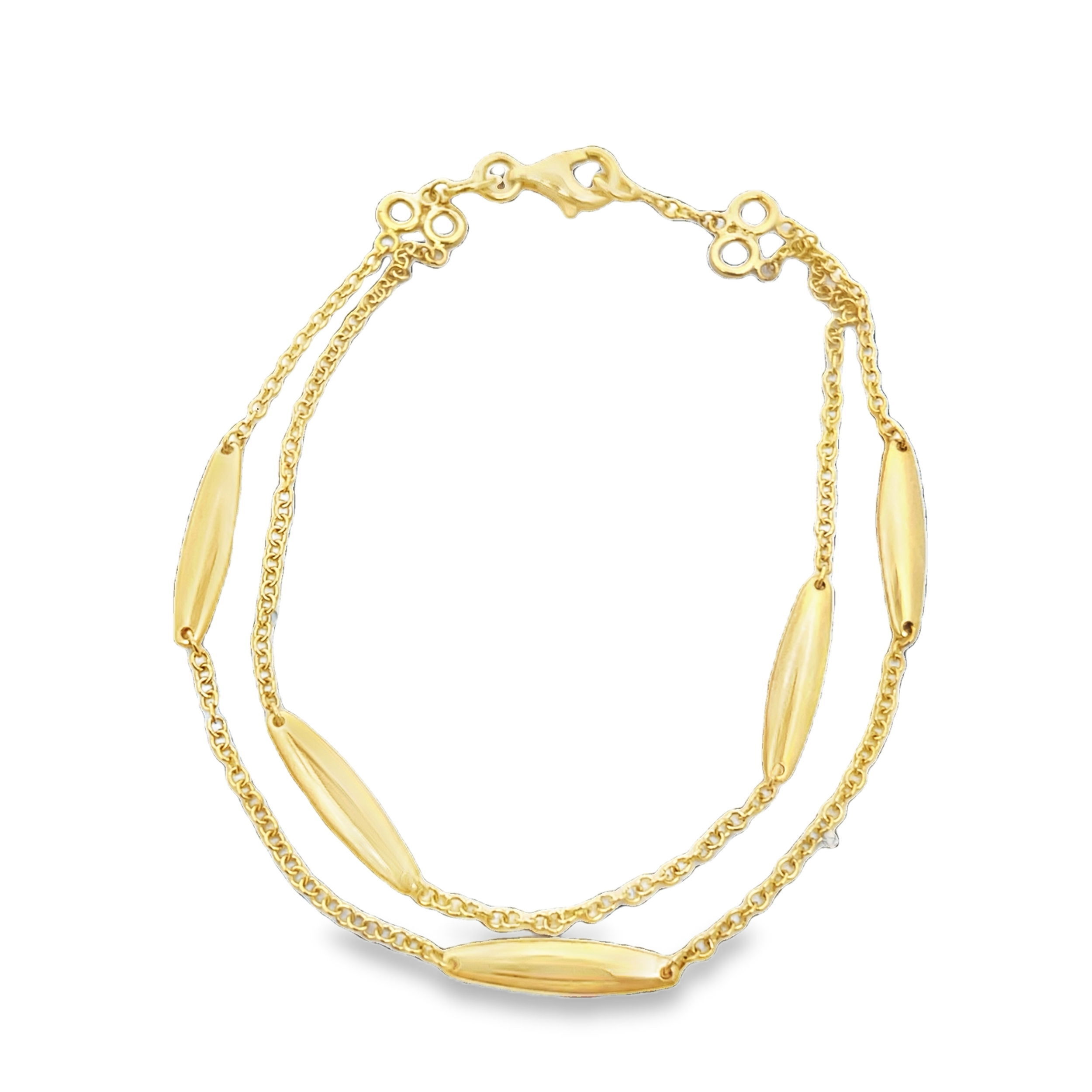 This lentil design bracelet features a sleek, polished finish, creating a smooth and sophisticated look. Its minimalist yet elegant style makes it perfect for layering or wearing solo as a refined statement piece.-18k Yellow gold-Chain length 7.5"Item# 808-2000286 Double Strand Lentil Station Bracelet