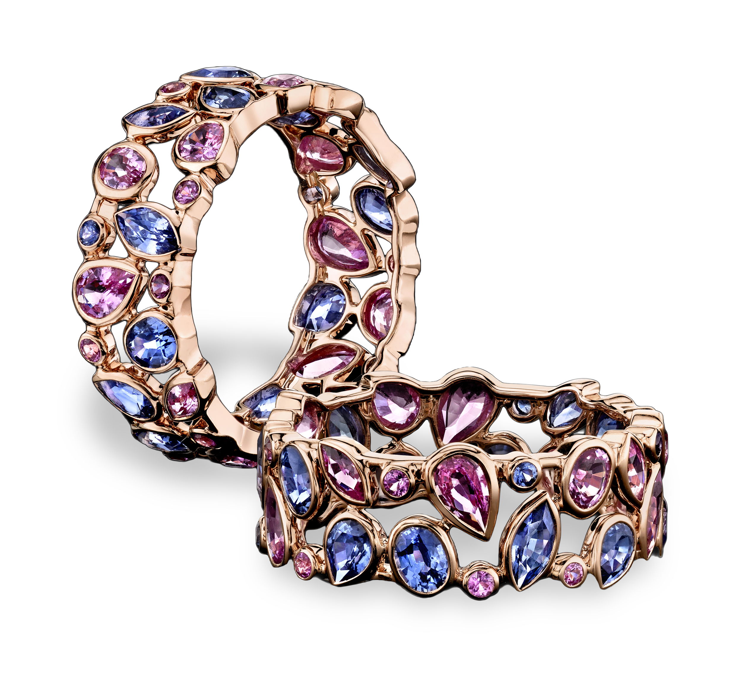 The De La Vie eternity ring shimmers with a delicate mix of light blue and pink sapphires, set in warm rose gold for a soft, romantic glow. A beautiful symbol of love and life's sweetest moments, it’s the perfect ring to cherish forever.-18k Rose gold-Mixed cut pink sapphire, 2.24cts-Mixed cut blue sapphire, 2.05cts-Size 7Item# 804-2000291 Light Blue and Pink Sapphire De La Vie Eternity Ring