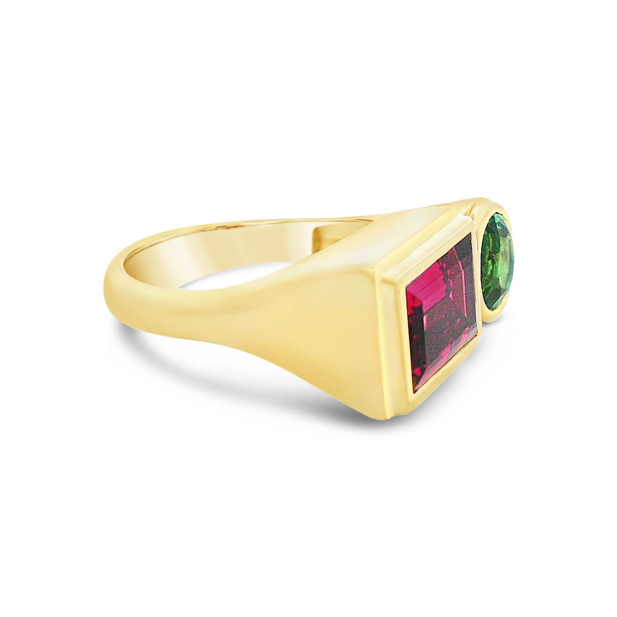 This 18k yellow gold ring brings a bold contrast with vibrant tsavorite and pink tourmaline, creating a striking yet playful look. A perfect mix of color and elegance, it’s a standout piece for any occasion.-18k Yellow gold-Pink tourmaline, 3.11ct-Tsavorite, 1.53ctItem# ND-Ring-00025 POW Tourmaline X Tsavorite Ring