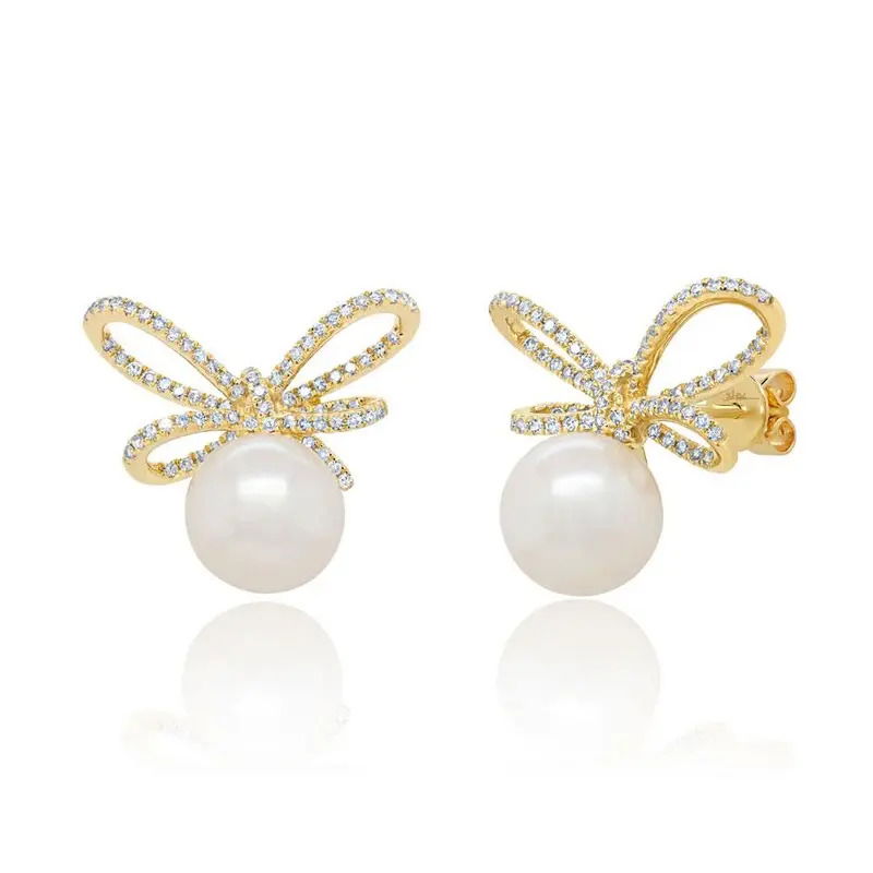 Like the perfect bow, these 14k yellow gold studs with diamonds and cultured pearls are the finishing touch to any look. Pearls are back in a big way—and this timeless pair proves they're here to stay.-14k Yellow gold-Cultured pearls-Diamonds, 0.47ctsItem# 805-2000480 Pearl Bow Earring Studs