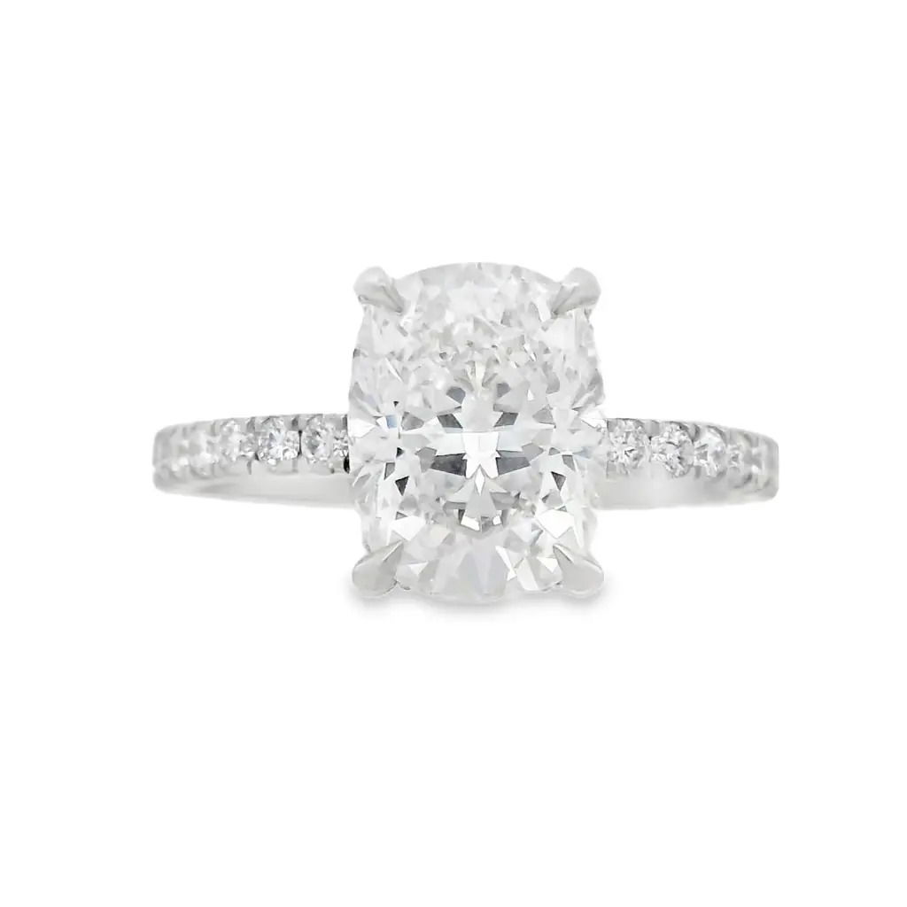With its exceptional quality and timeless design, this ring is the perfect symbol of your love and commitment. Featuring a dazzling 2.45ct lab grown cushion cut diamond set in 14k White gold with a hidden halo for added brilliance.-14k White gold-Cushion lab grown diamond, 2.45cts-Round lab grown diamonds, 0.49cts-Size 6.5, Contact for sizing optionsItem# 100-2000046 Cushion 2.45ct Hidden Halo Engagement