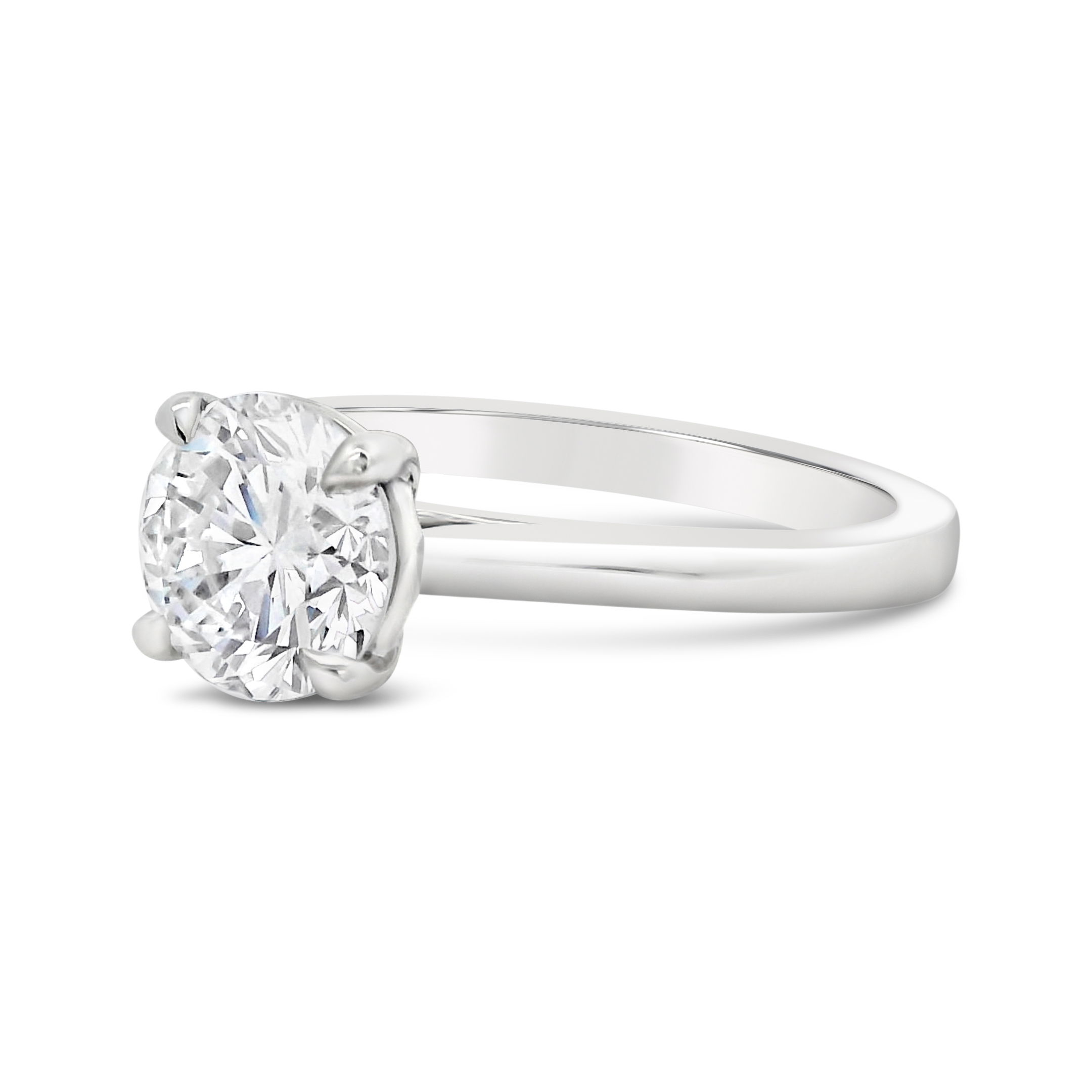 Crafted in platinum, this semi-mount offers a durable and refined foundation for your center stone. Its understated design lets your diamond take center stage. (Center stone not included)-Platinum-Size 6.5, Contact for sizing optionsItem# 140-2000037 Quinn