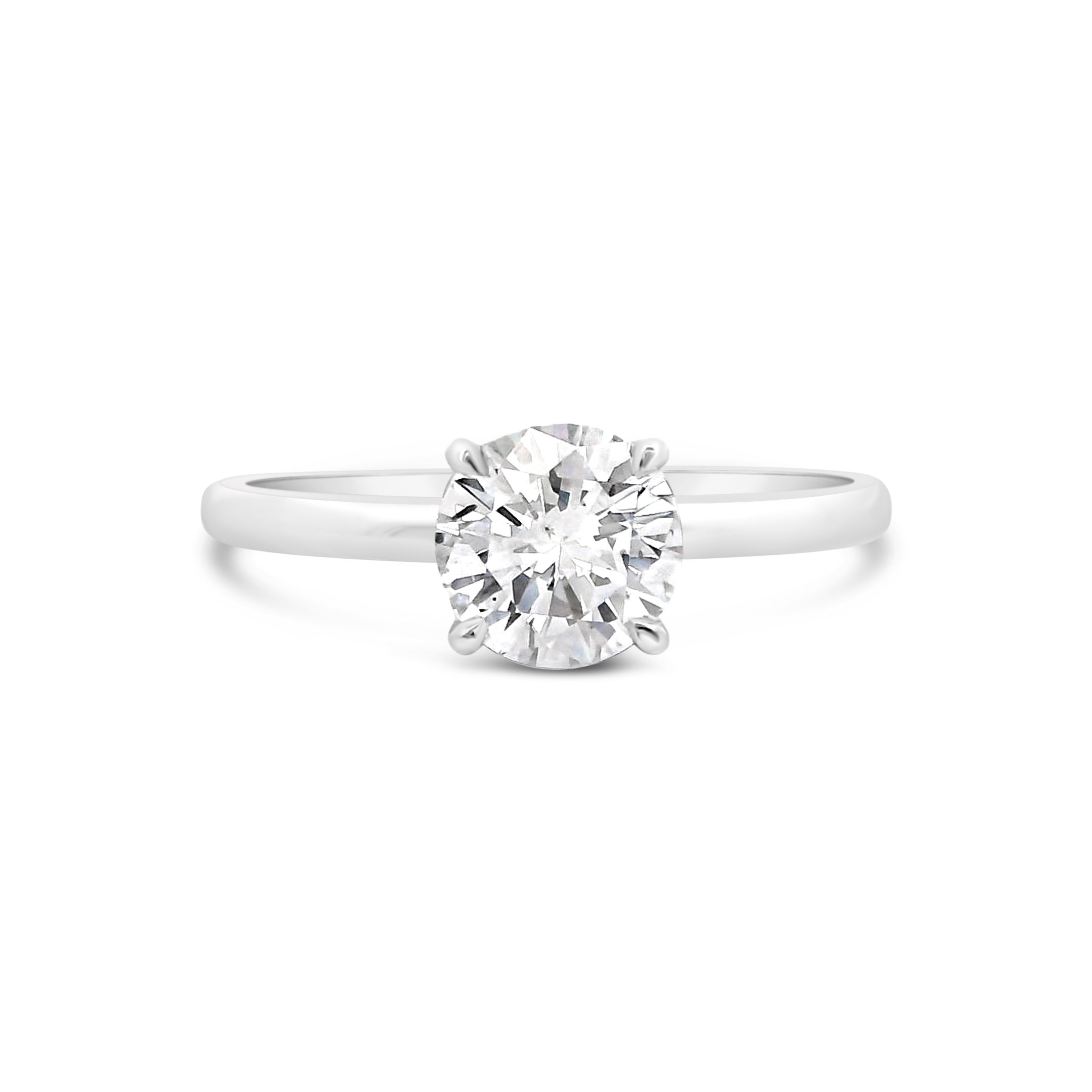 This 18k white gold semi-mount offers a clean, polished setting ready to showcase your chosen center stone. Its sleek design keeps the focus on what matters most—your unique story. (Center stone not included.) -18k White gold-Size 6.5, Contact for sizing optionsItem# 140-2000039 White Gold Solitaire