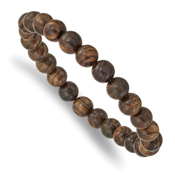 Introducing the Tigerwood Stretch Bracelet – a harmonious blend of natural elegance and timeless style, perfect for any jewelry collection. Handcrafted with exquisite precision, this bracelet features a series of lustrous Tigerwood beads, each showcasing its unique grain and rich, warm hues reminiscent of deep golden sunsets and serene forest landscapes.-Tigerwood-Size, 7.25Item# Helios-00016 Tigerwood Stretch Bracelet