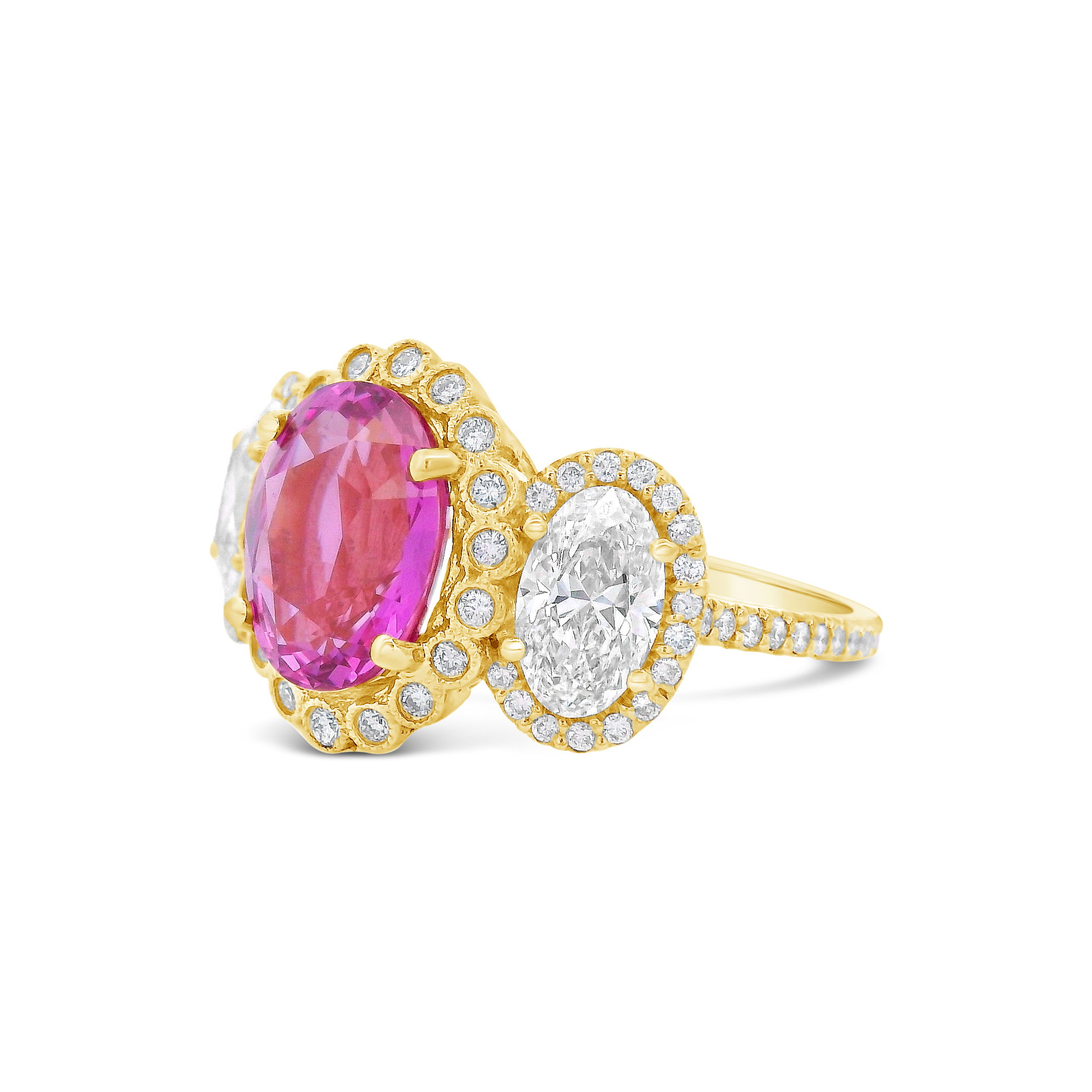 Erica Courtney presents this 18k yellow gold ring featuring a vivid oval pink sapphire flanked by two sparkling oval diamonds. It’s a graceful blend of soft color and classic form, perfect for marking a meaningful moment or simply celebrating personal style.-18k Yellow gold-Pink sapphire, 4.01ct-Oval diamonds, 1.40cts-Melee diamonds, 0.76cts-Size 7Item# 200-2000139 Blush Ring