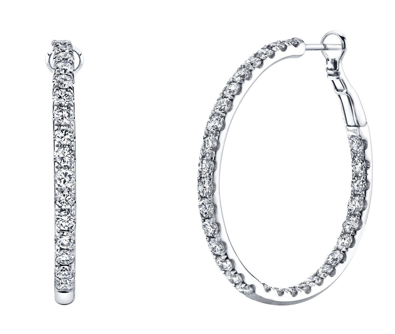 Crafted in 18K white gold, these 1.5-inch hoops feature sparkling diamonds set inside and out for brilliance from every angle. A timeless design with just the right touch of everyday luxury.-18k White gold-Round diamonds, 5.18cts-Length 1.5"Item# 150-2000118 Inside Out Micro Hoops