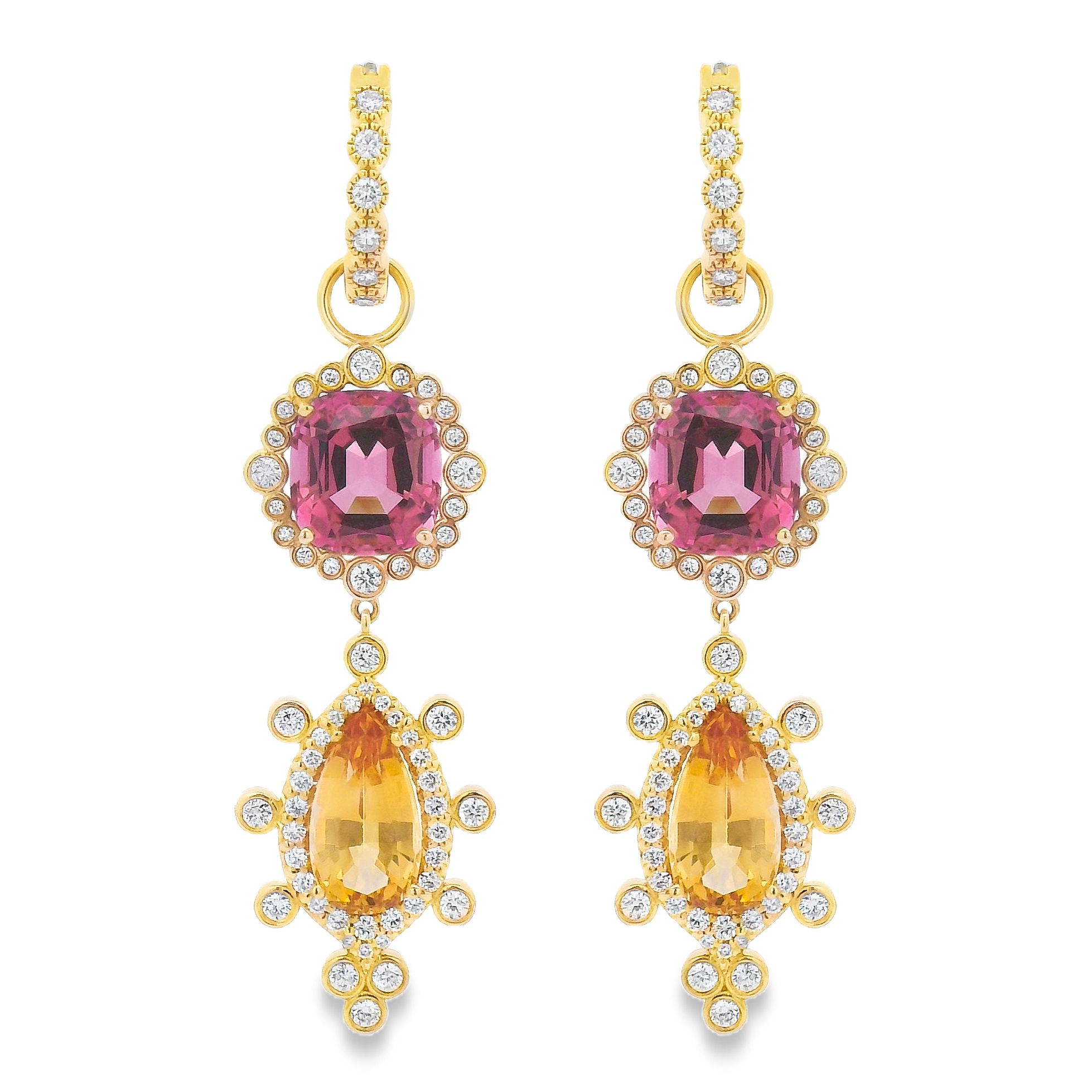 Set in 18K yellow gold, these stunning earring charms feature 6.58cts of dreamy peach tourmaline and 5.56cts of imperial topaz, accented with 0.66cts of sparkling diamonds. Warm, radiant tones meet timeless sophistication.-18k Yellow gold -Peach tourmaline, 6.58cts-Imperial topaz, 5.56cts-Diamond, F-G/VS, 0.66ctsItem# 809-2000098 Golden Hour Earring Charm